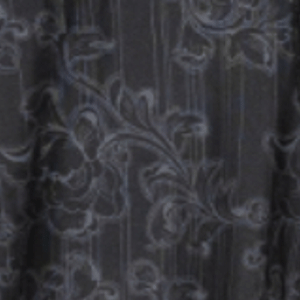 Close-up of a pair of men’s boxer briefs with a black floral pattern