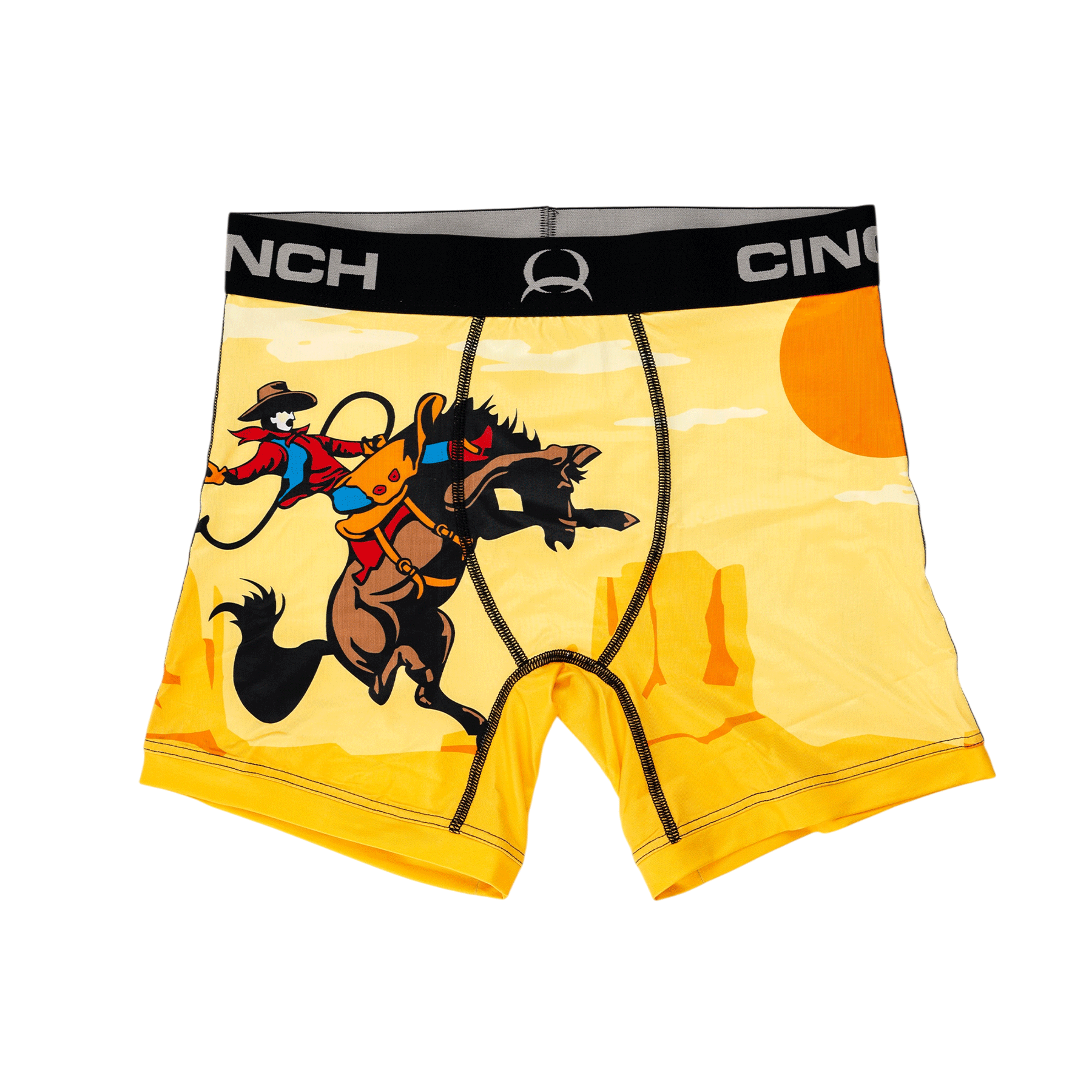Front view of men's Cinch underwear with a black waistband, featuring a cowboy riding a bucking bronco in the desert on a yellow background