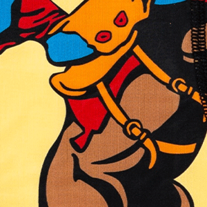 Close-up of men's Cinch underwear featuring a cowboy riding a bucking bronco in the desert on a yellow background