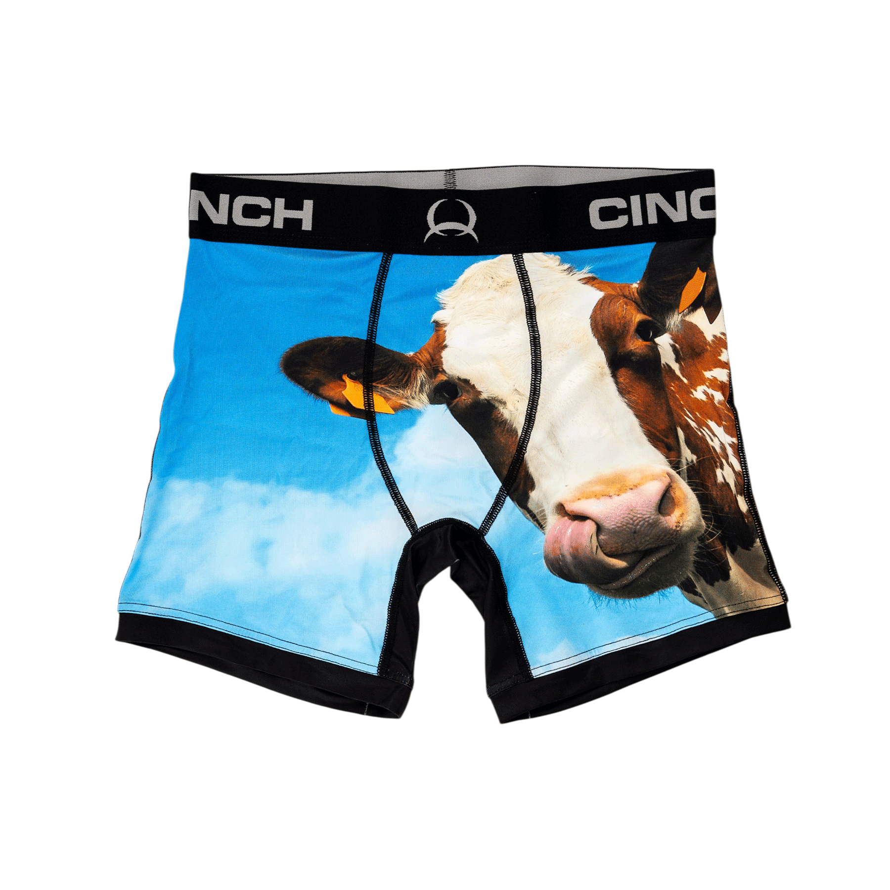 Front view of men's Cinch underwear with a black waistband, featuring a picture of a cow on a blue sky background