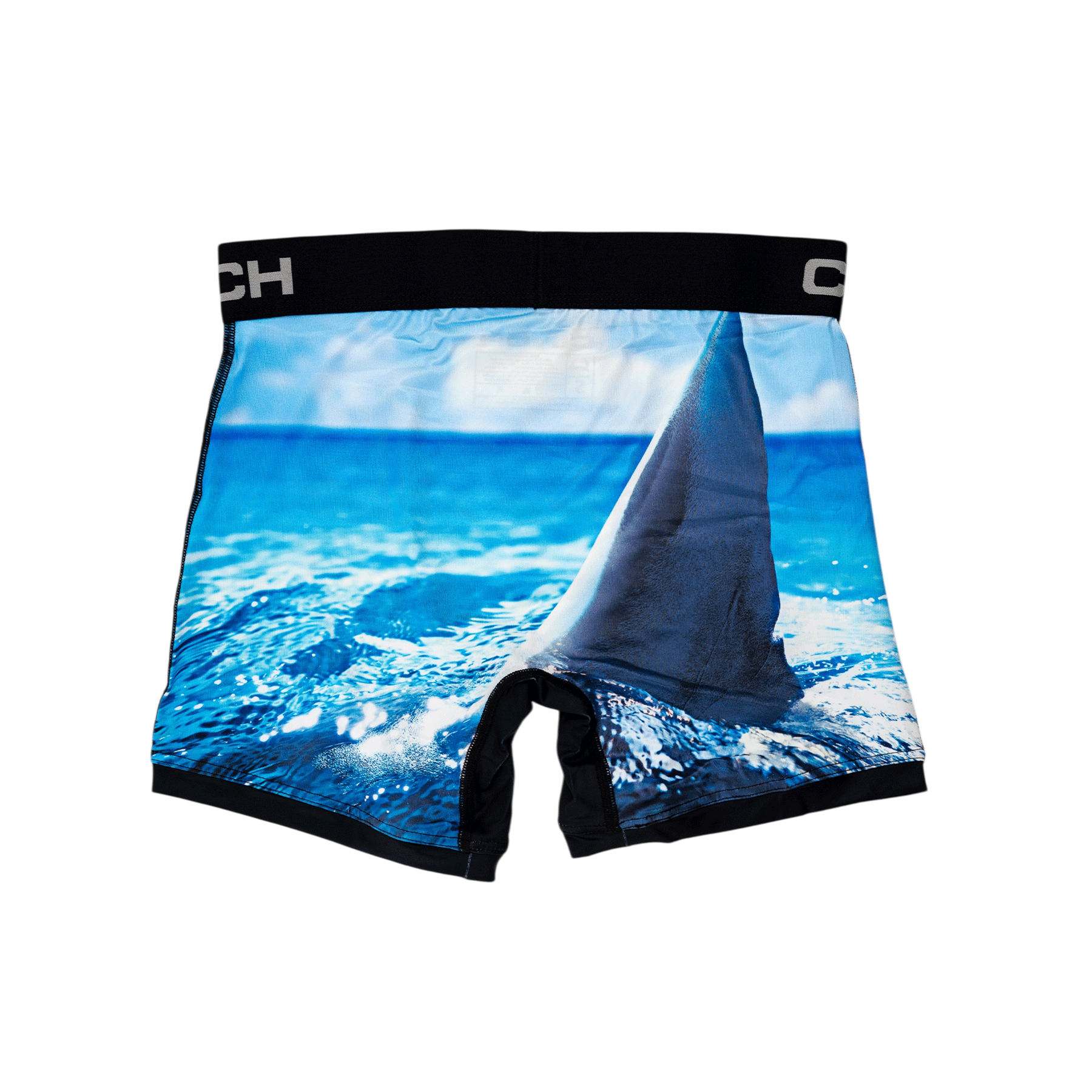 Back view of men's Cinch underwear with a black waistband, featuring a picture of a shark fin in the ocean