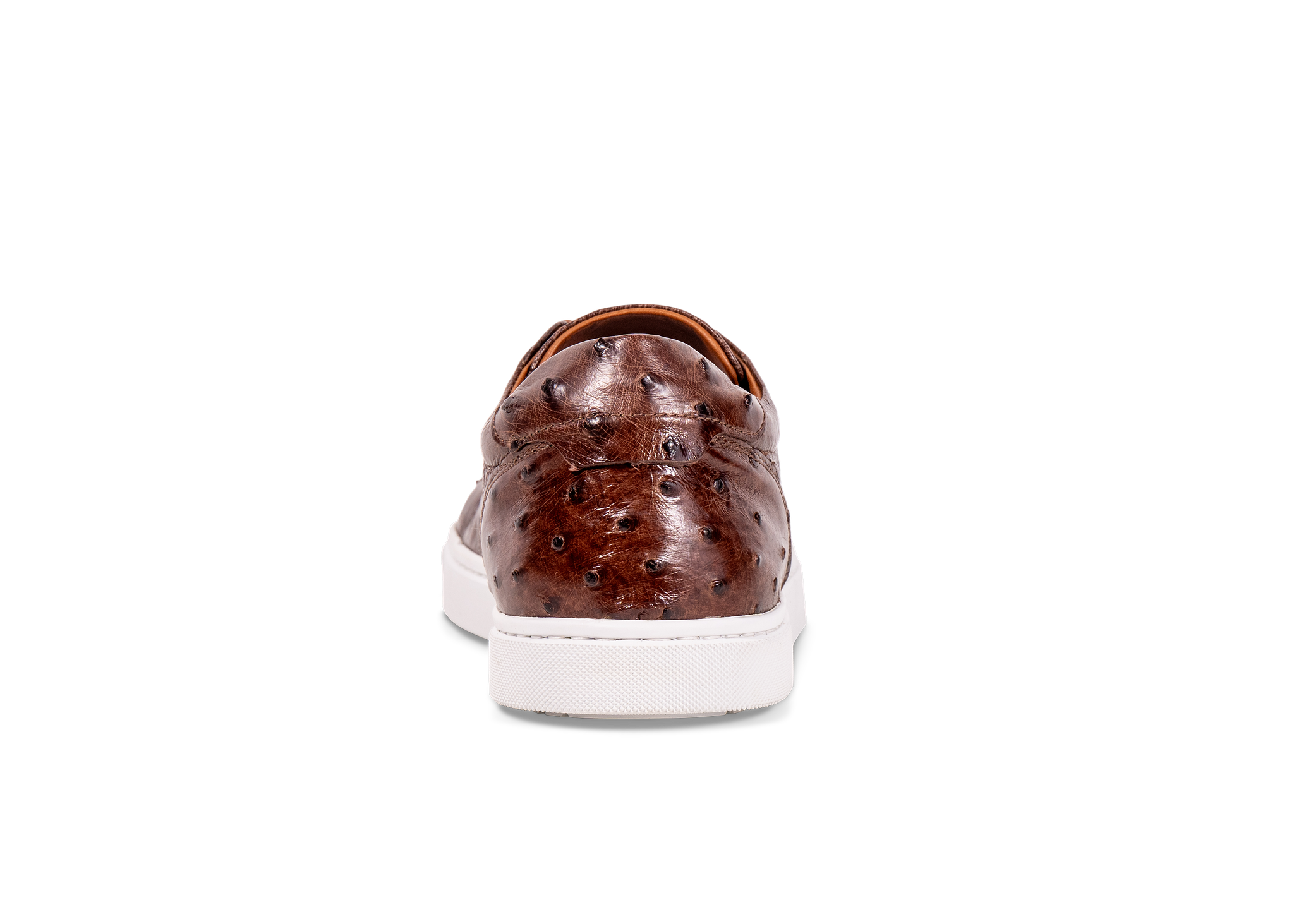 Go West Supply cognac ostrich leather sneaker with white sole on a white background