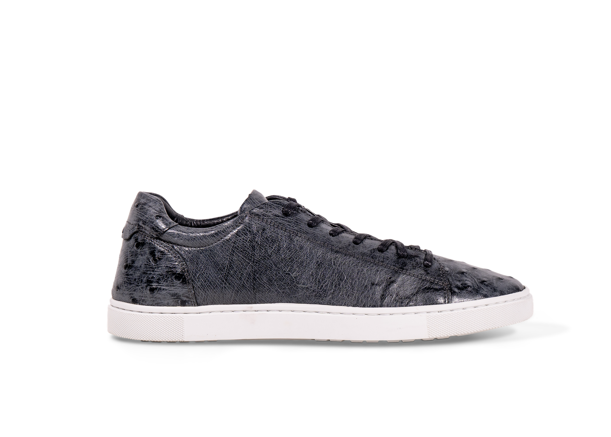 Pair of Go West Supply navy ostrich leather sneakers with white sole on a white background