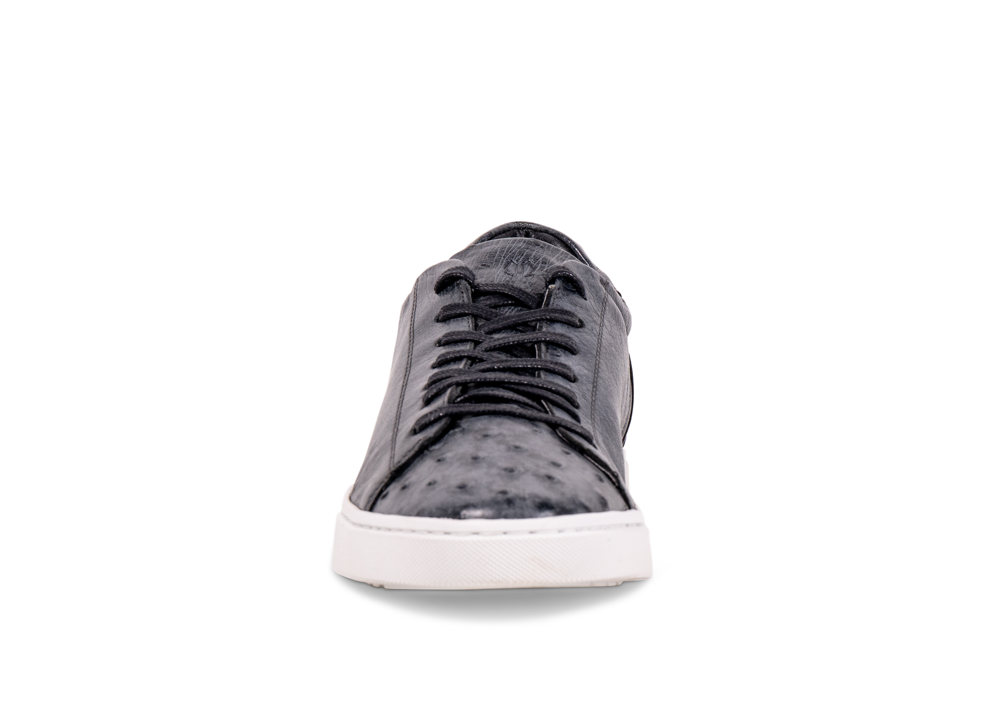 Pair of Go West Supply navy ostrich leather sneakers with a white sole on a white background
