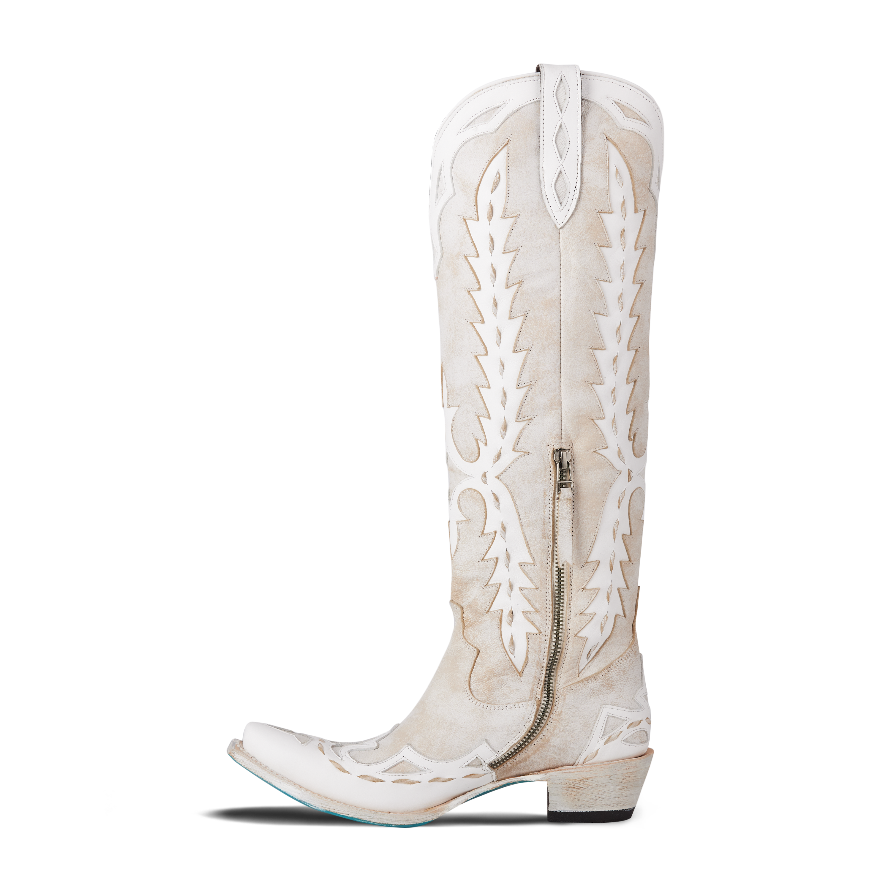 Side view of white knee-high boot showing tall shaft and pointed toe