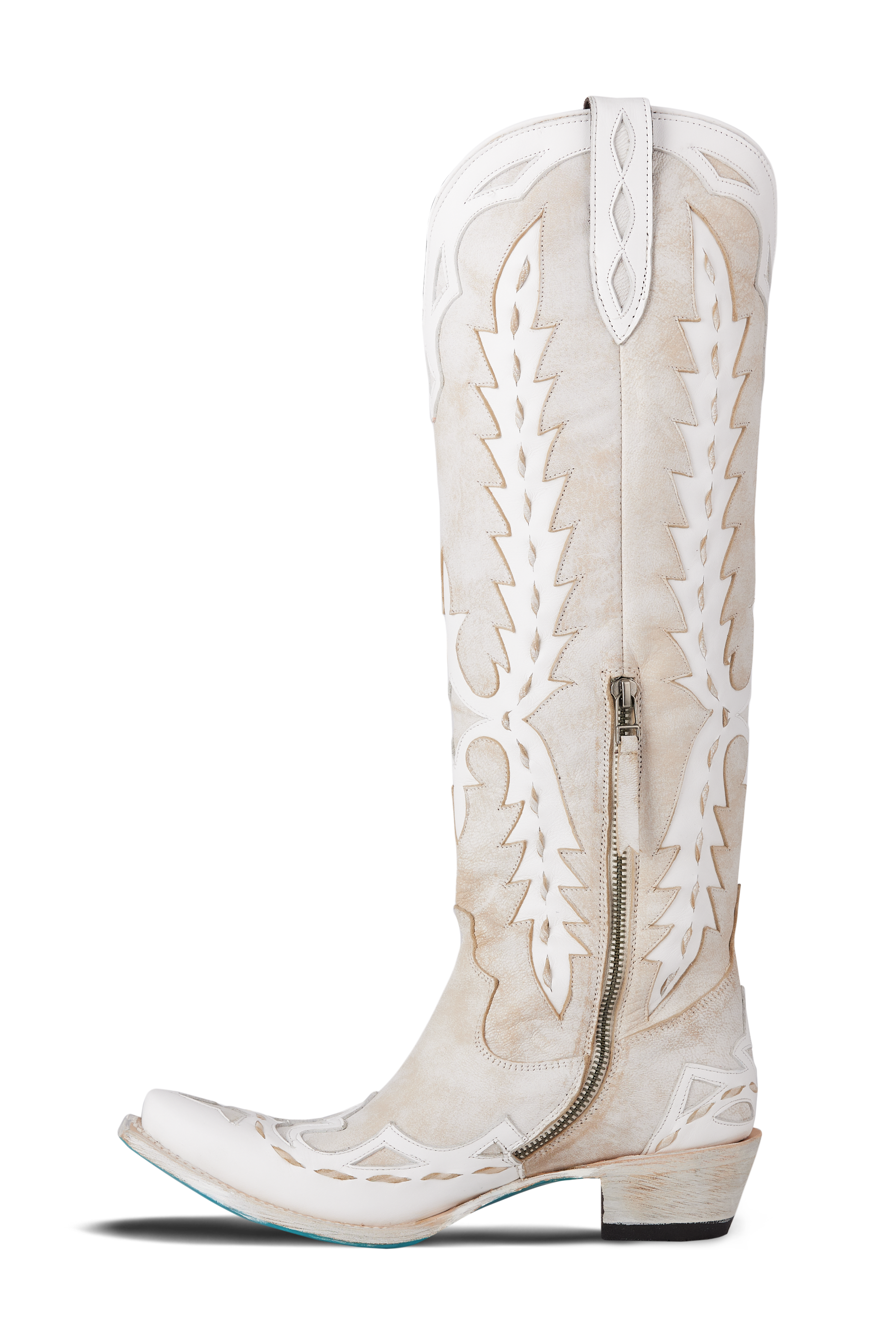Side view of white knee-high boot showing tall shaft and pointed toe