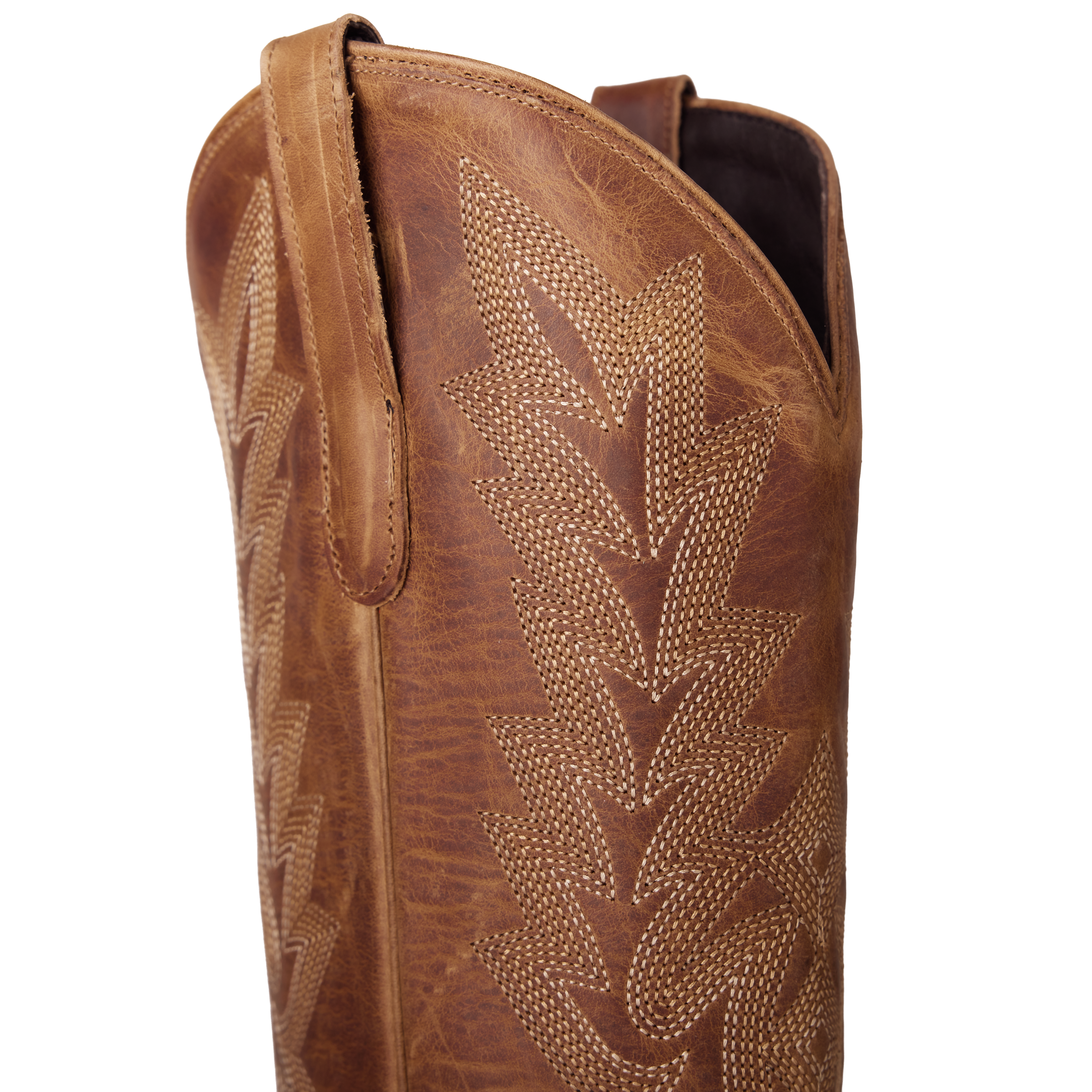 Close-up of a brown leather cowboy boot shaft featuring decorative cream stitching in a bold, layered arrow pattern, with a pull strap along the side