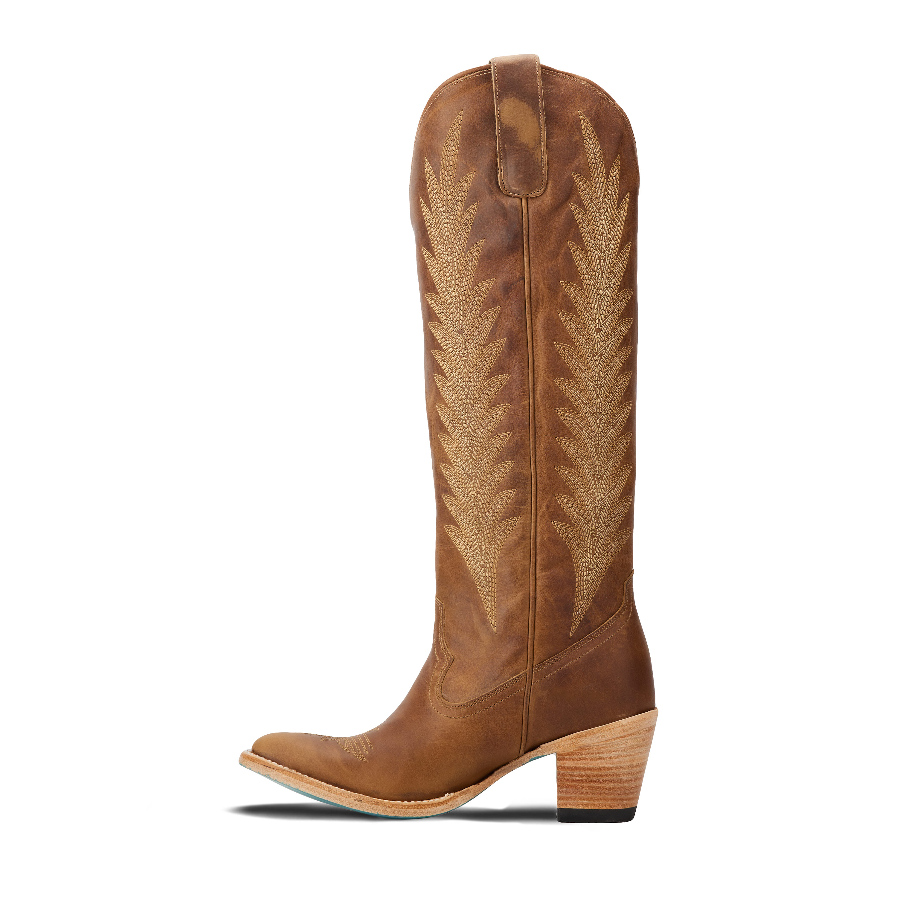 Side view of a tall brown cowboy boot with decorative stitching on the shaft, pull tabs at the top, a pointed toe, and a stacked heel