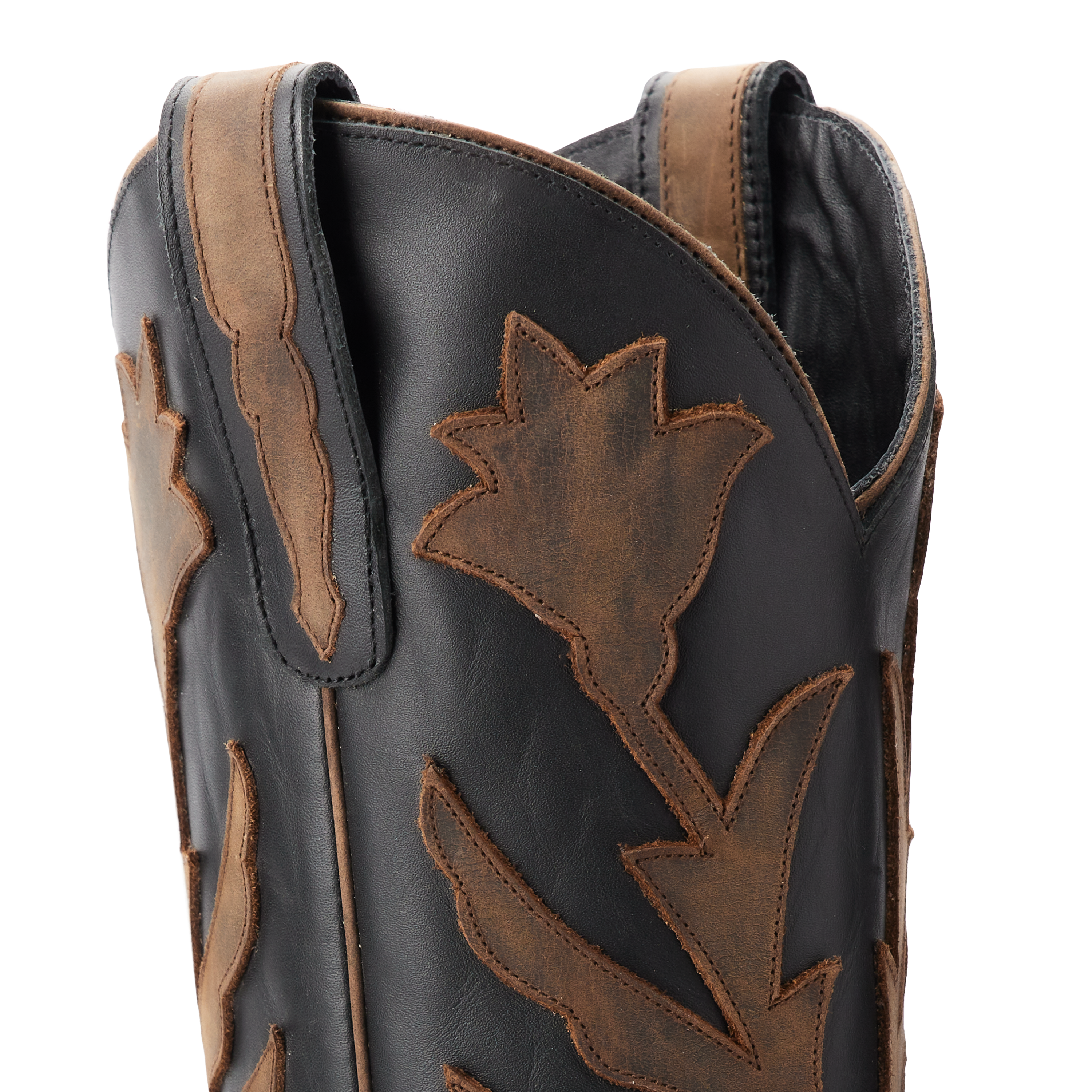Close-up of the upper shaft of a black cowboy boot with brown floral inlays and pull straps on each side