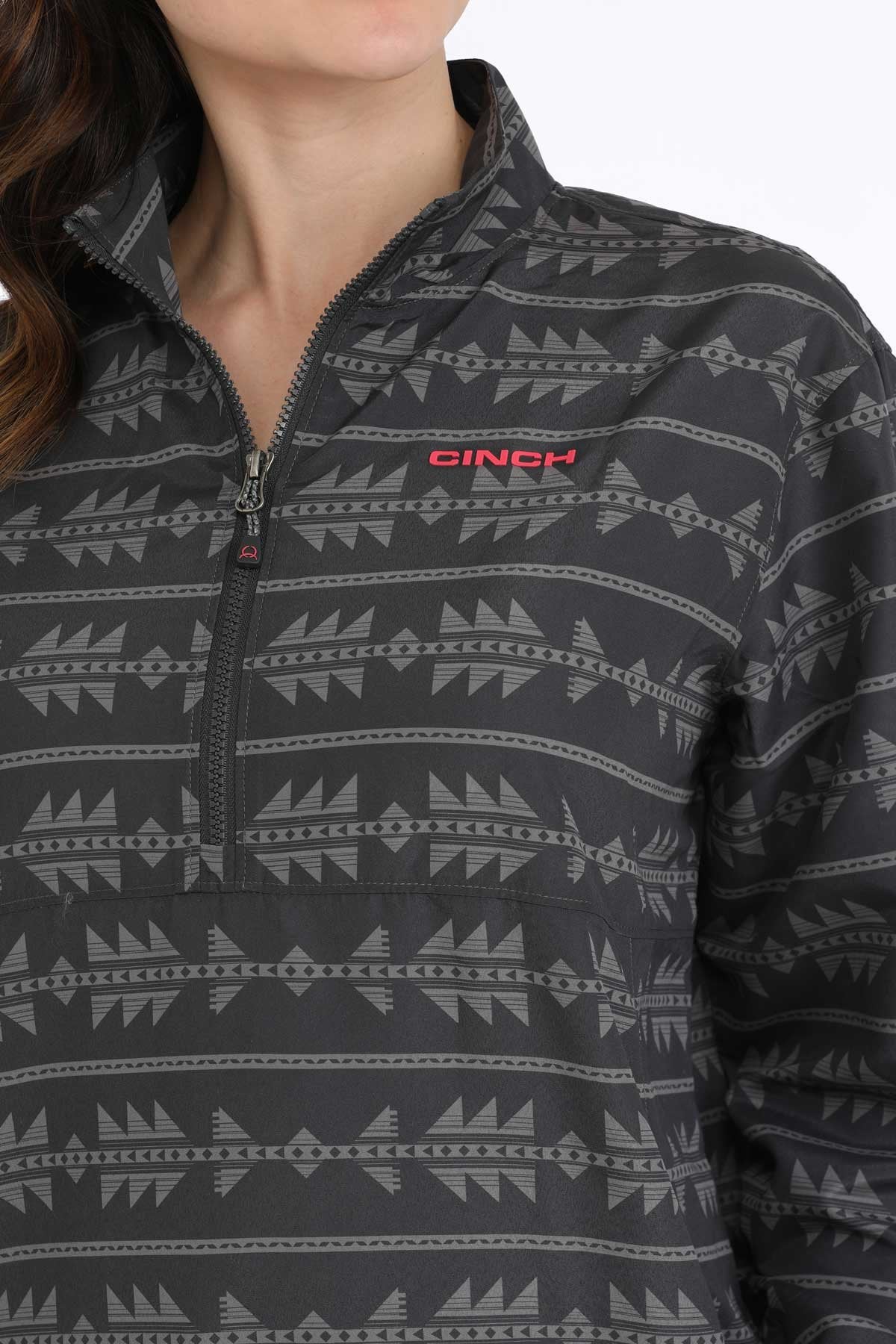 Black and gray patterned pullover with Cinch logo on a white background