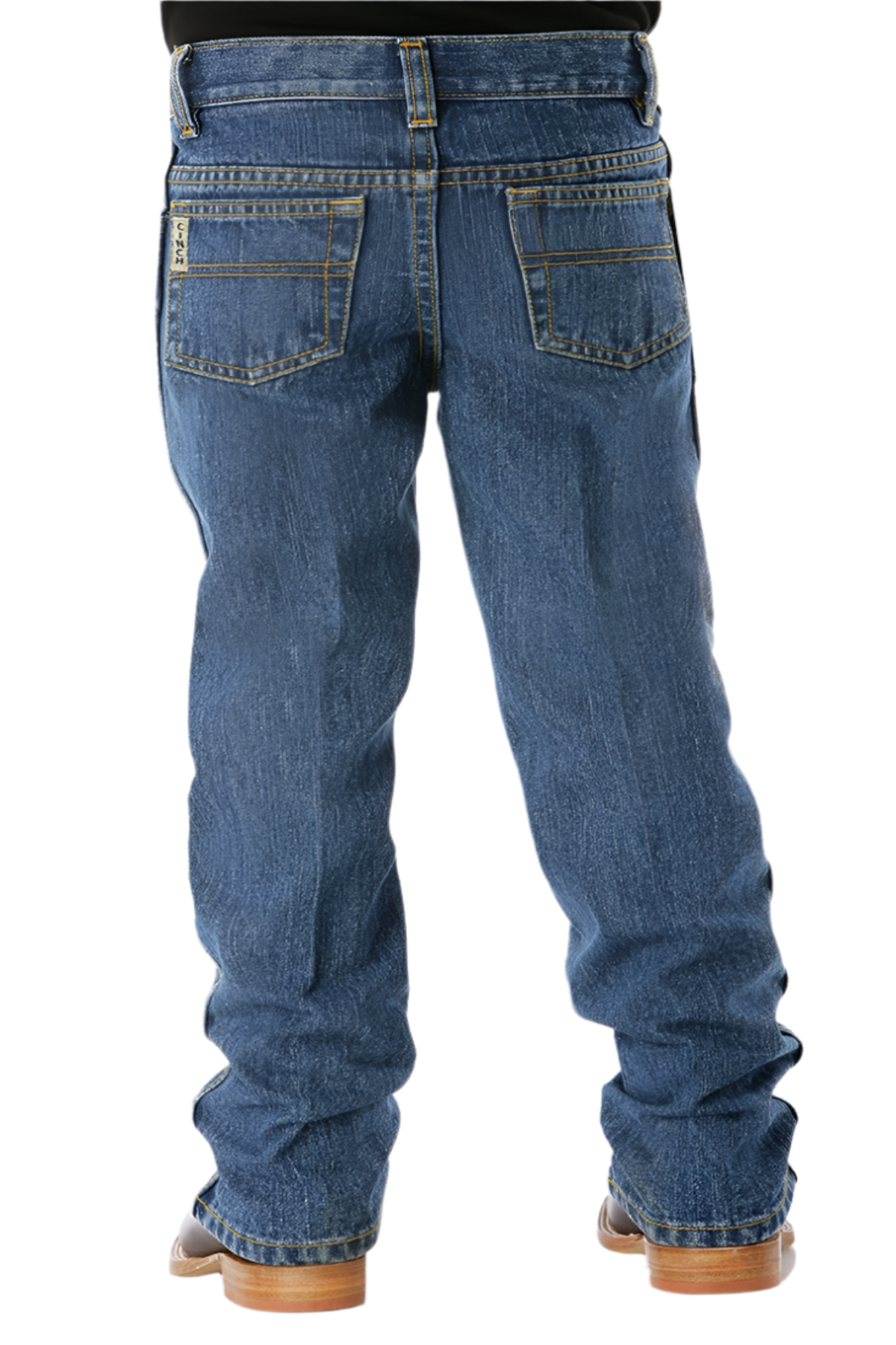 Back view of medium wash Cinch boys’ slim fit jeans with classic five-pocket styling, worn with boots