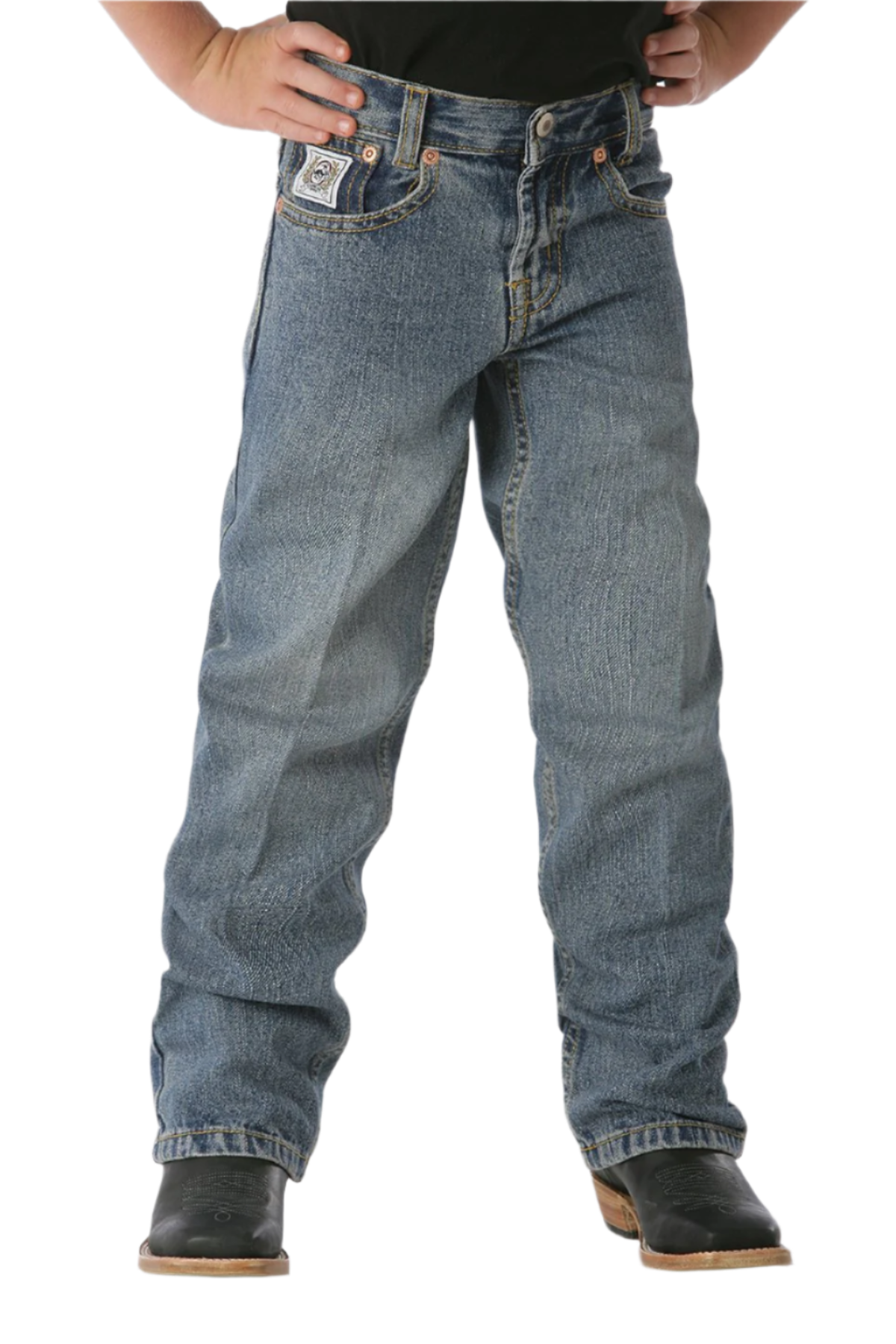 Boy wearing medium wash jeans and boots