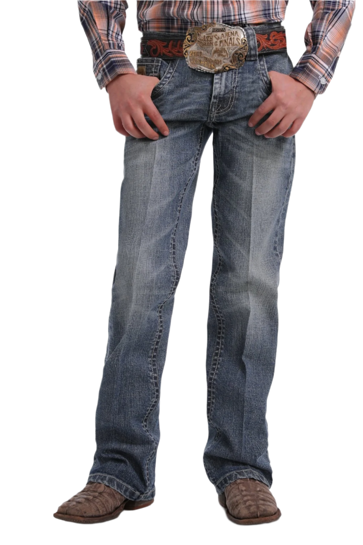 Child wearing medium stone wash Cinch jeans with boots