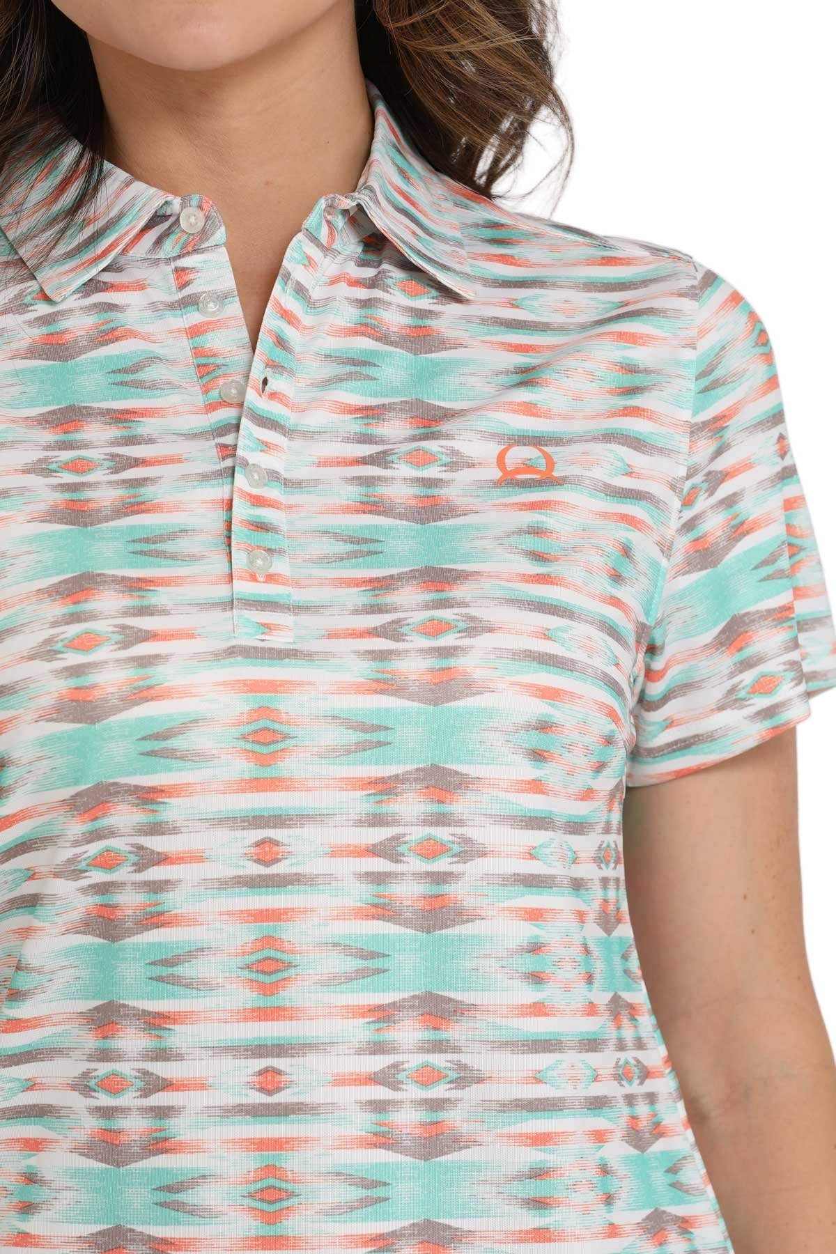 Close-up of a woman wearing a patterned short-sleeve polo shirt