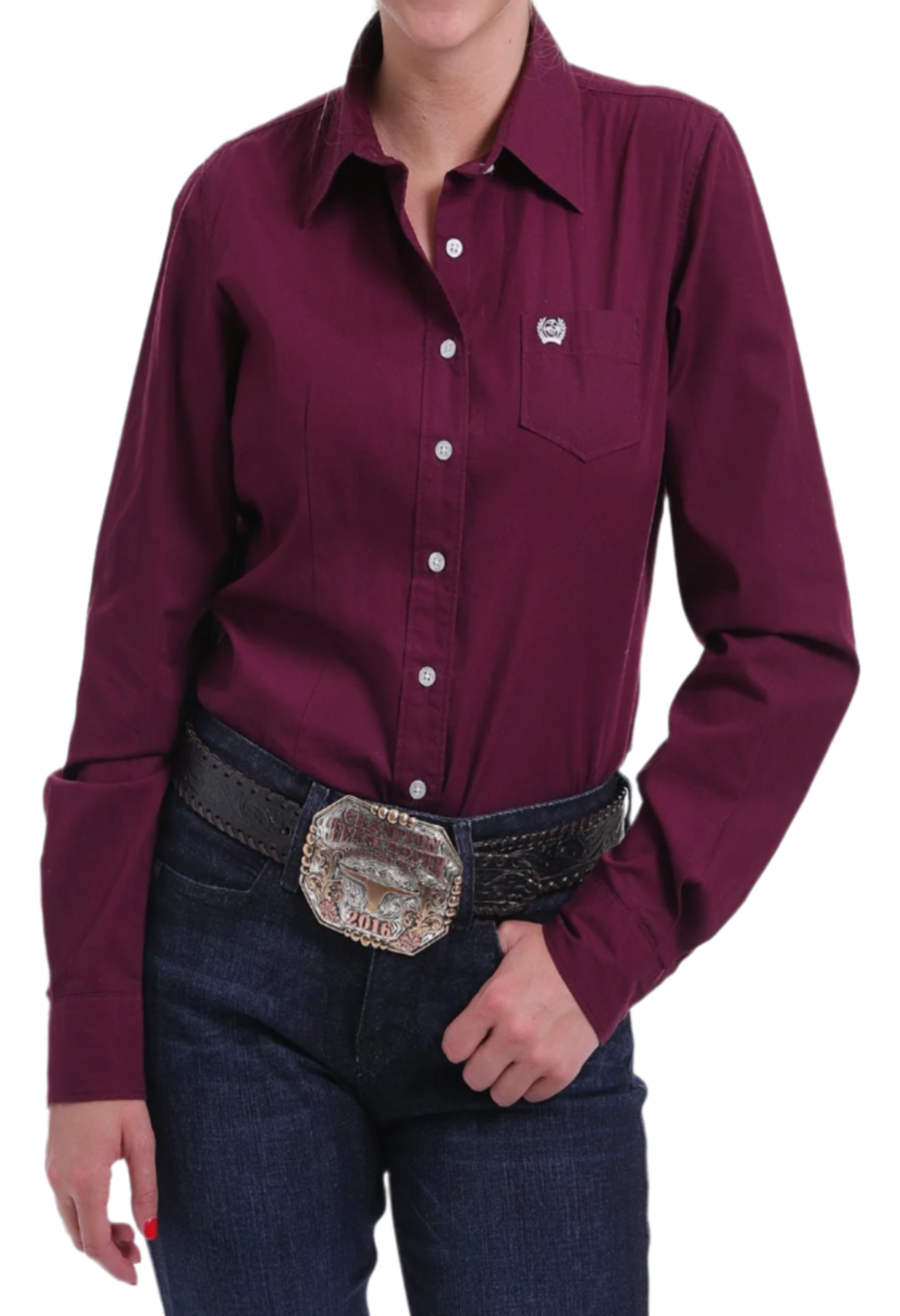 Woman wearing a burgundy button down shirt with jeans and a western belt