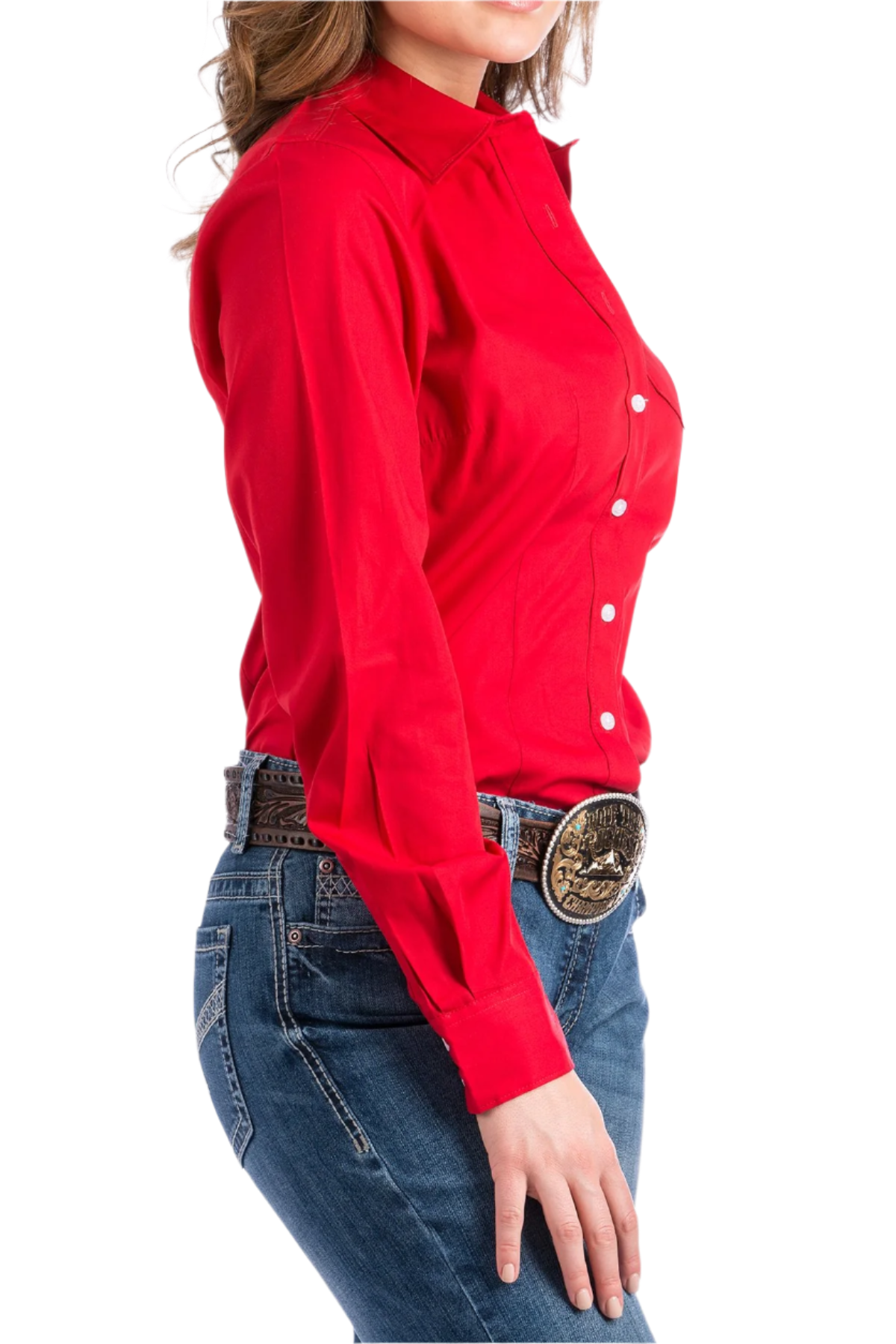 Woman wearing a red button down shirt with jeans and a western belt