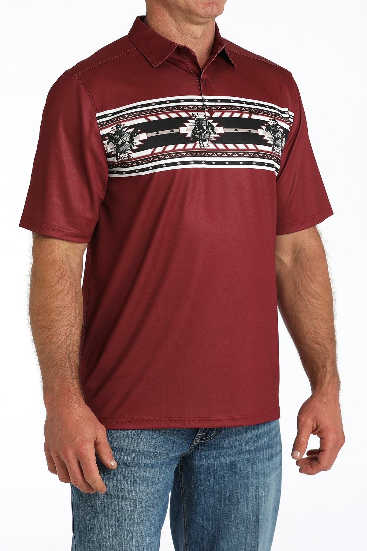 Man wearing a maroon short-sleeve polo shirt with a black and white patterned chest stripe and blue jeans displayed on a white background.