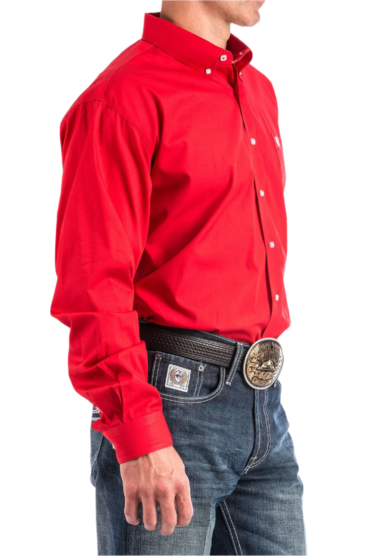 Man wearing a red button down shirt with jeans and a western belt