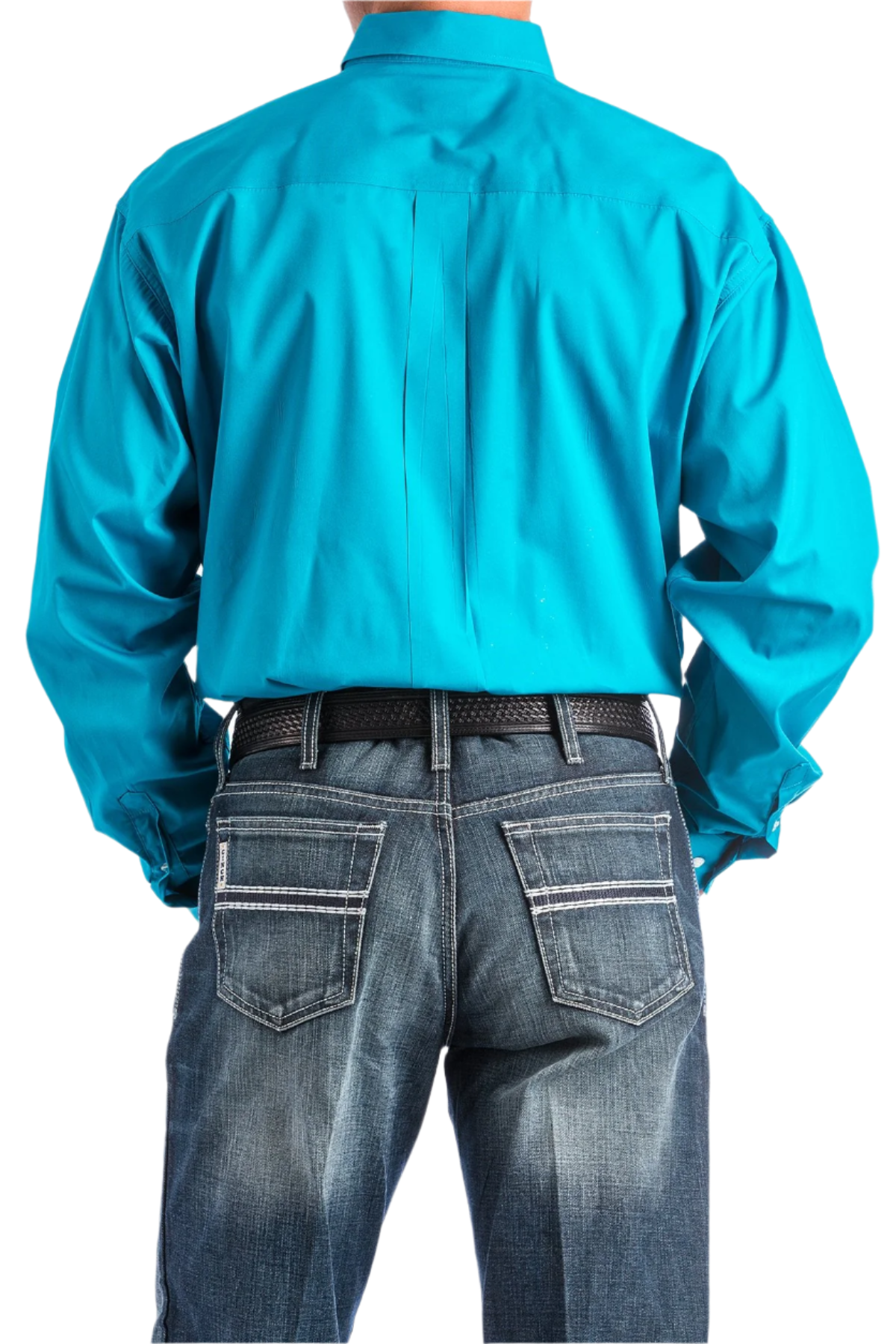 Back view of a man wearing a long-sleeve teal blue button-down shirt and blue jeans, with a belt