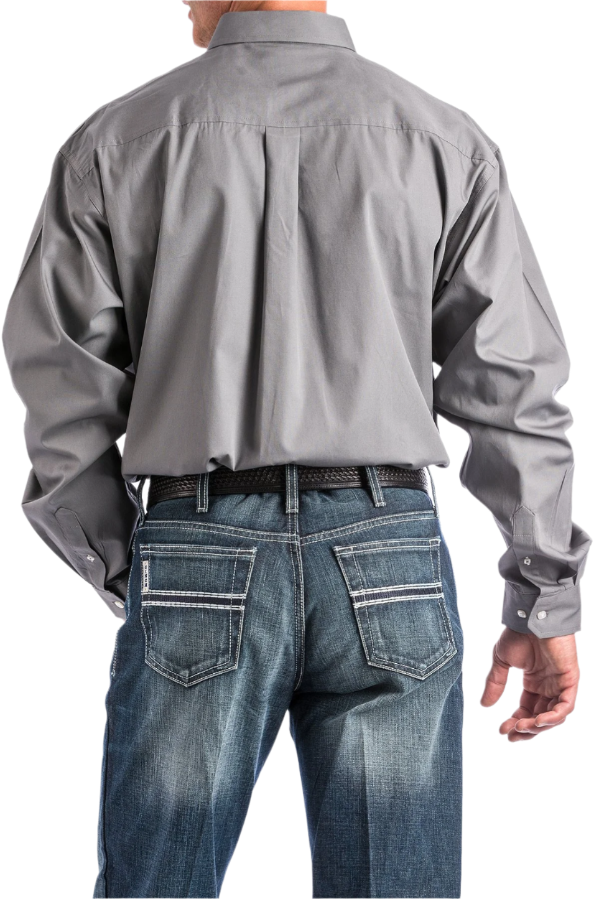 Back view of a man wearing a long-sleeve grey button-down shirt and blue jeans, with a belt and buckle visible.