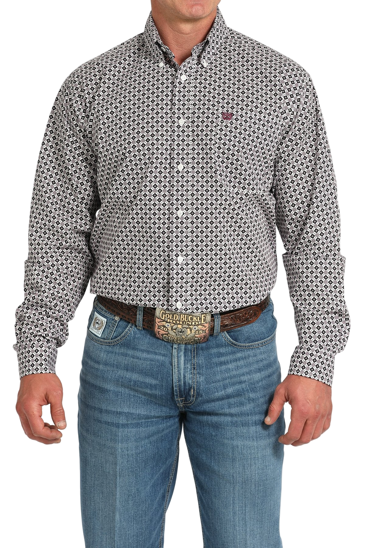 Man wearing a gray patterned button-up shirt with blue jeans on a white background