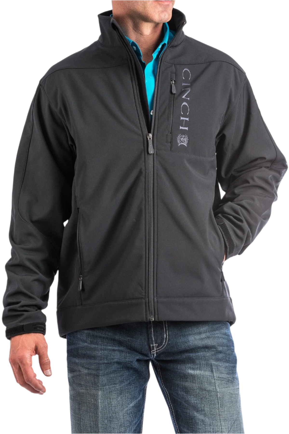 Man wearing a black jacket with the Cinch logo and jeans