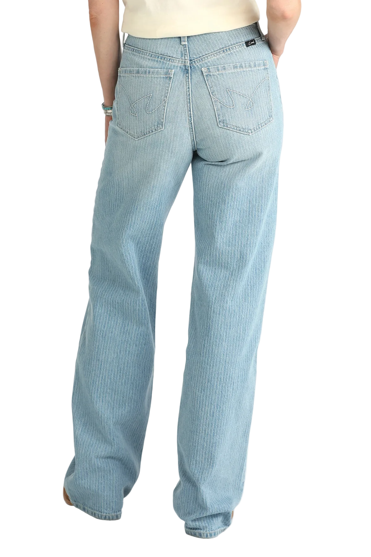 Light blue jeans worn by a person on a white background