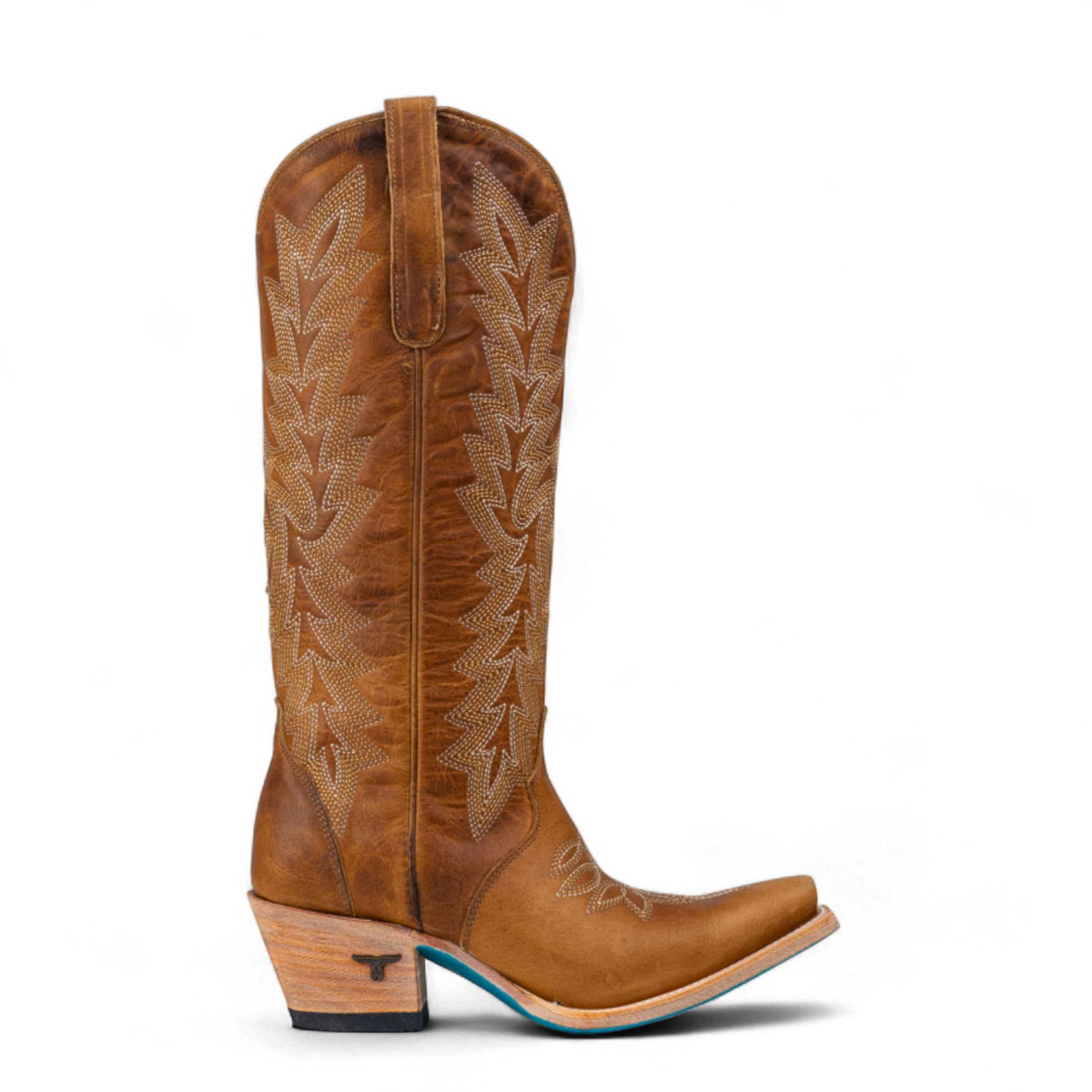 Brown cowboy boot with intricate design on a white background