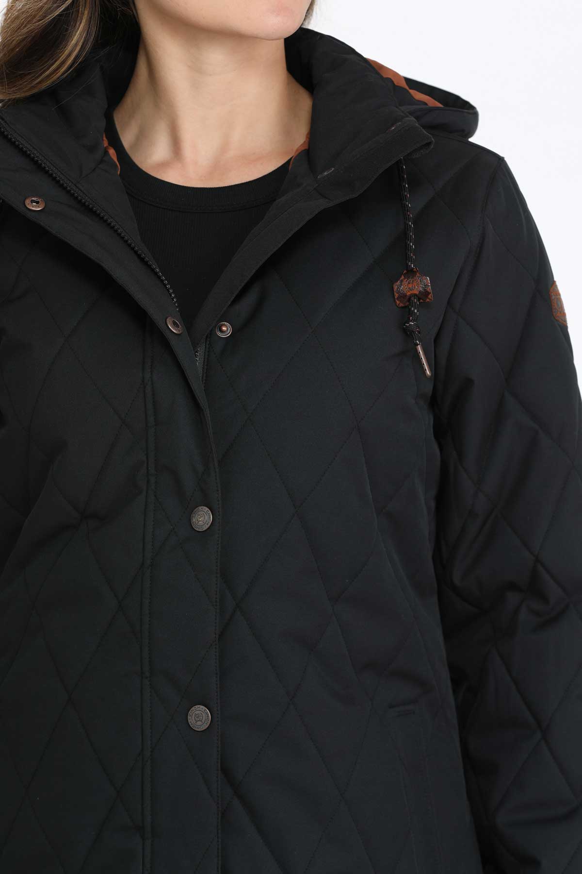 Close-up of a woman wearing a black coat 