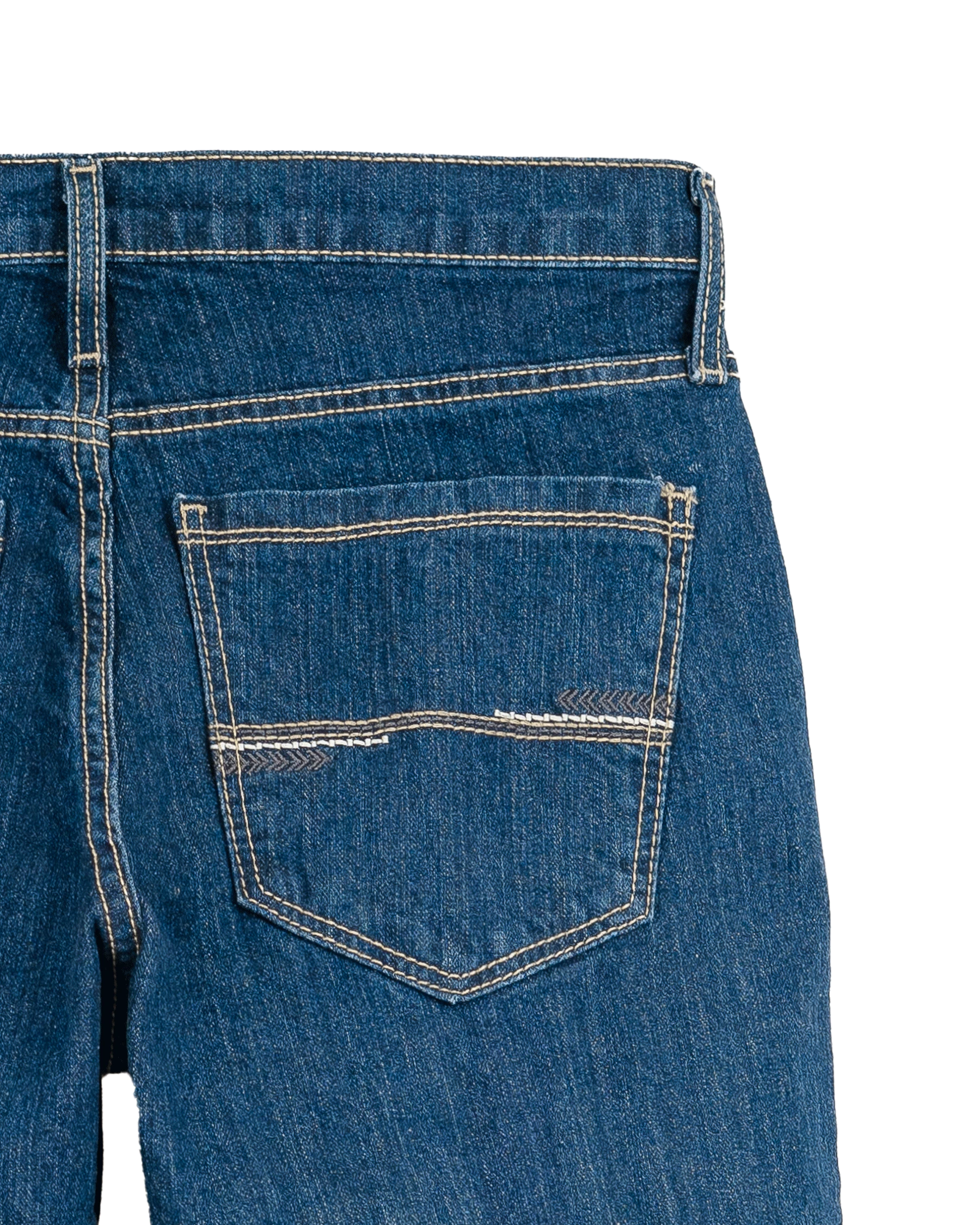 Close-up of blue jeans with a pocket on a white background