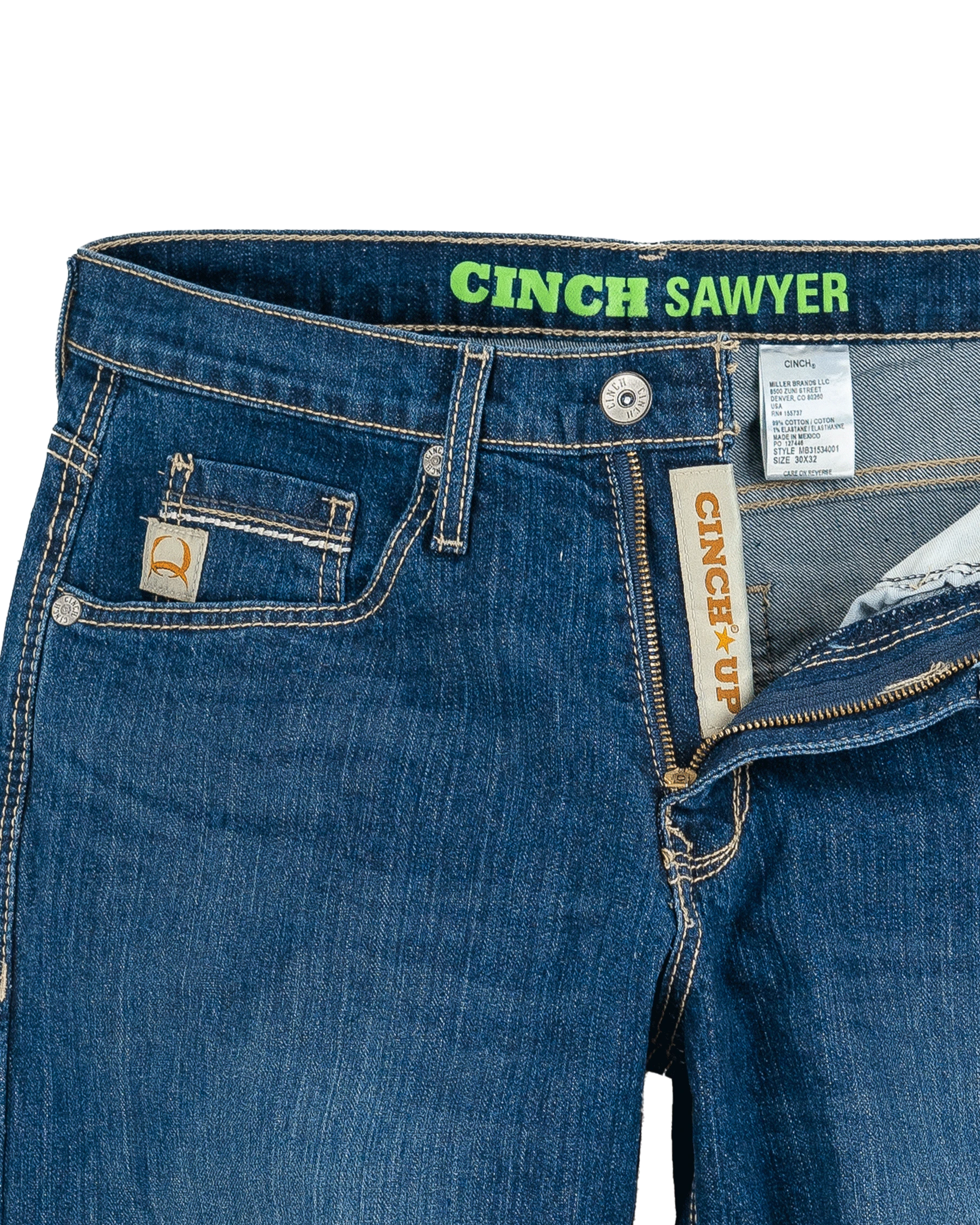 Close-up of blue jeans with 'Cinch Sawyer' branding on a white background