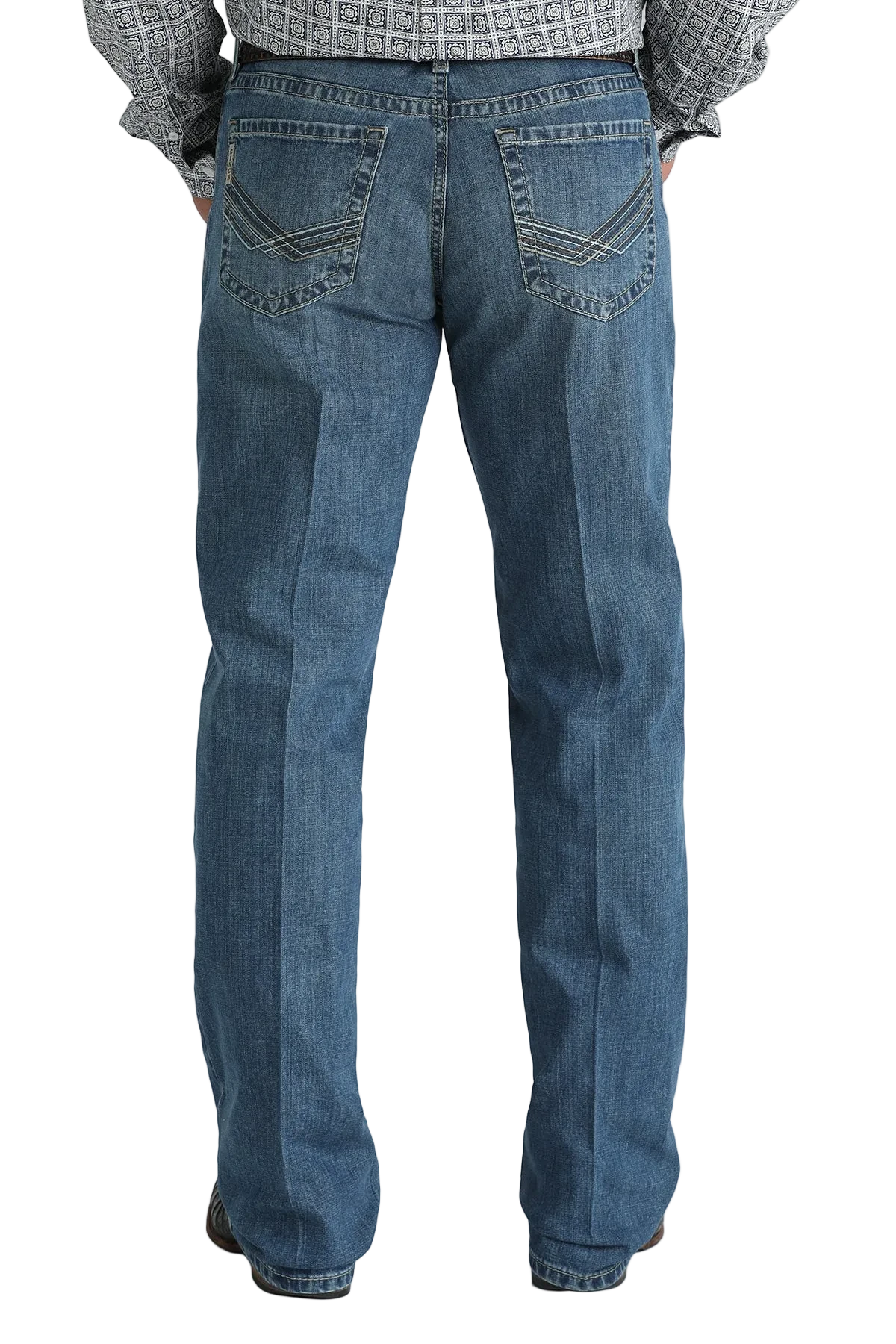 Blue jeans worn by a person on a white background