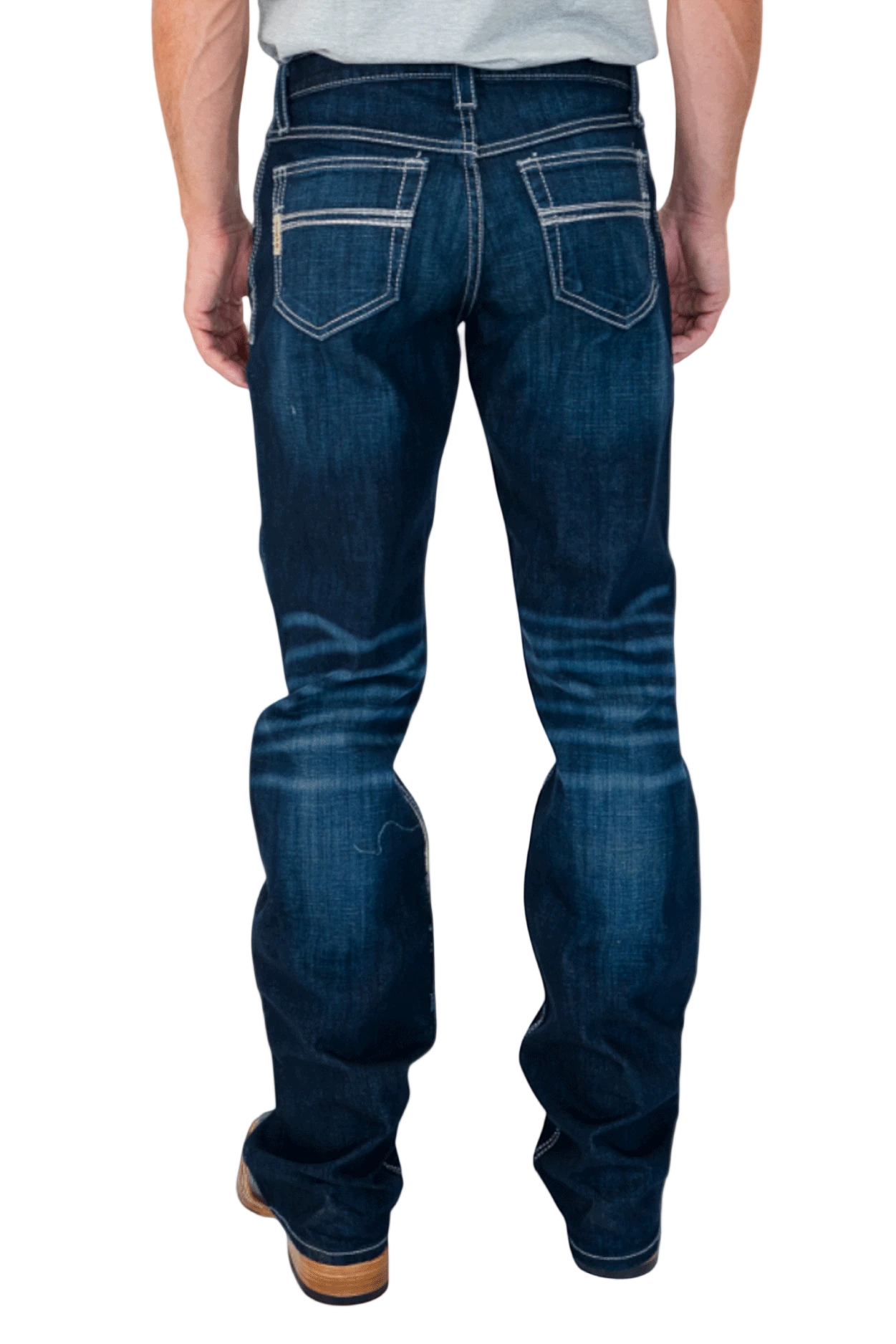 Person wearing blue jeans on a white background