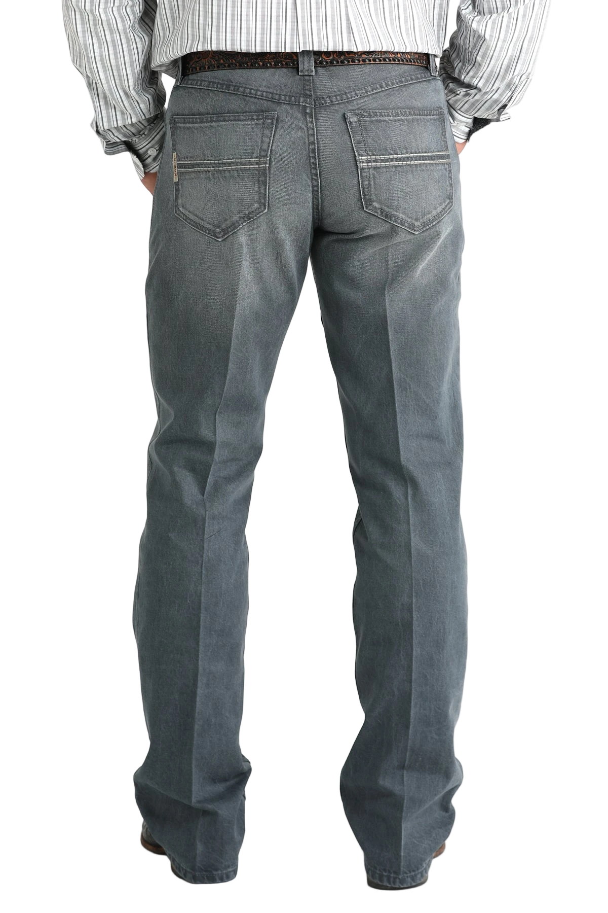 Person wearing gray jeans on a white background