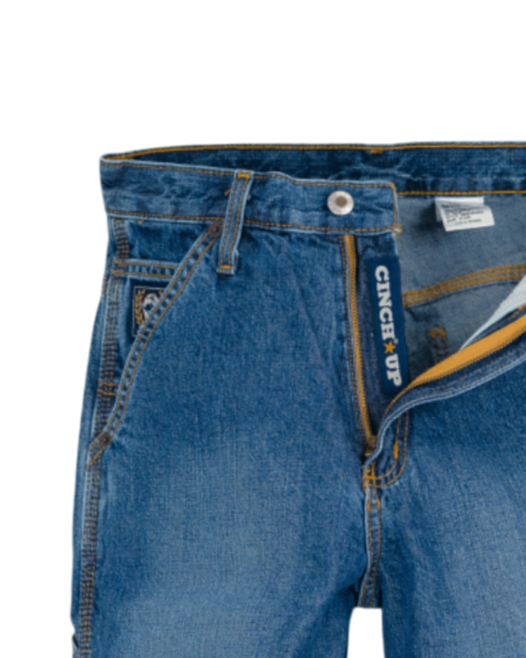 Close-up of blue jeans with a visible brand label on a white background