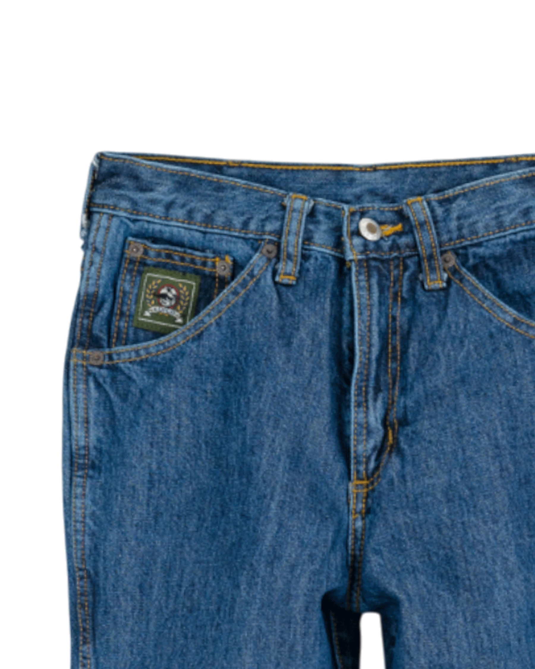 Close-up of blue jeans with a brand logo on the pocket against a white background
