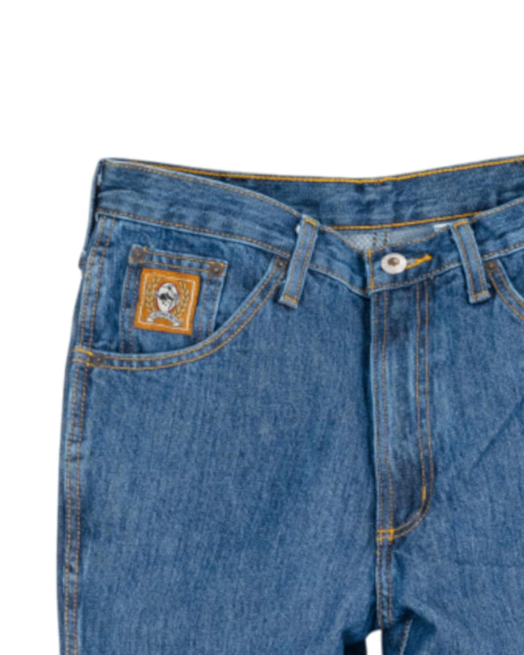 Close-up of blue jeans with a brand logo on the pocket against a white background