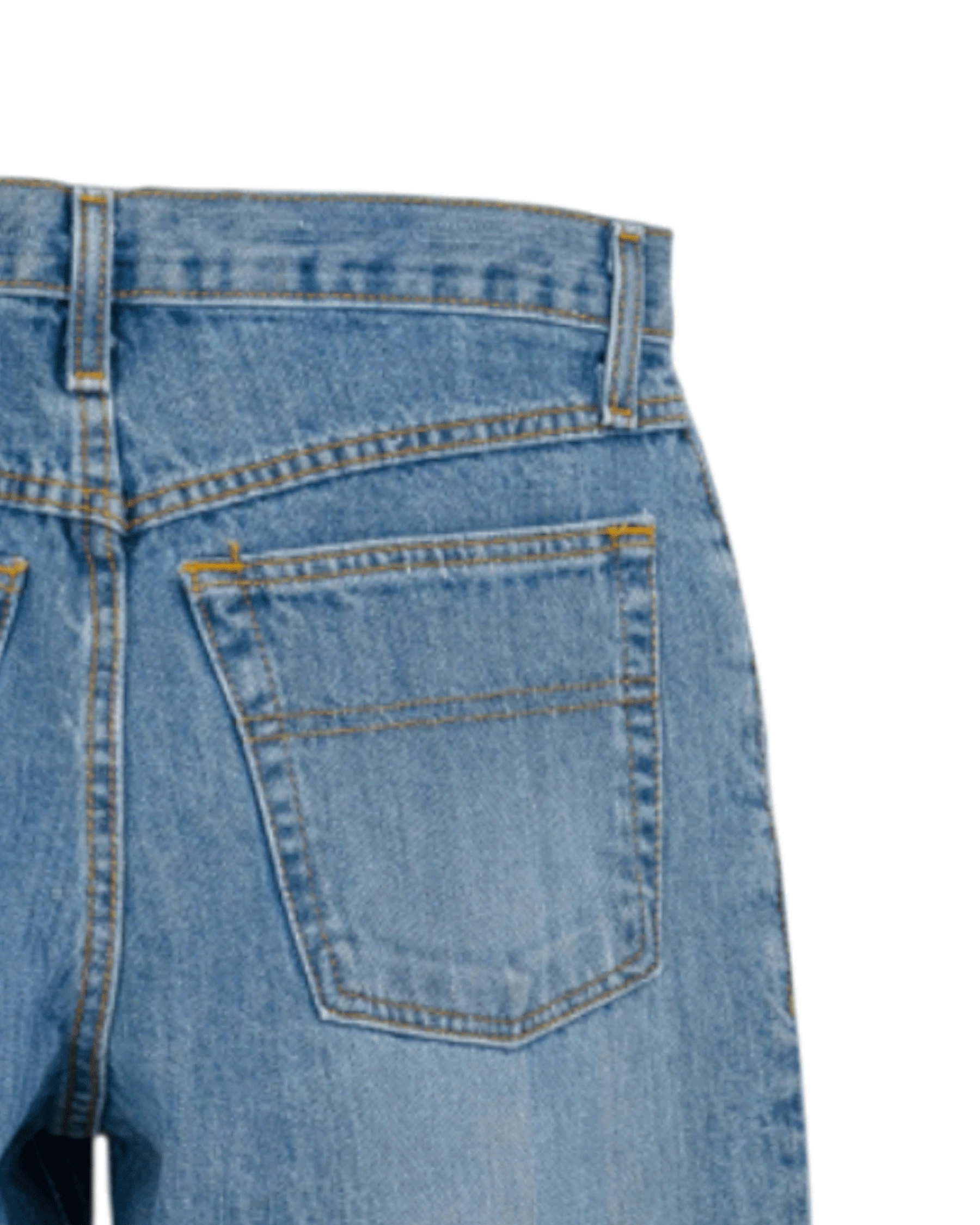 Close-up of blue denim jeans with a pocket on a white background