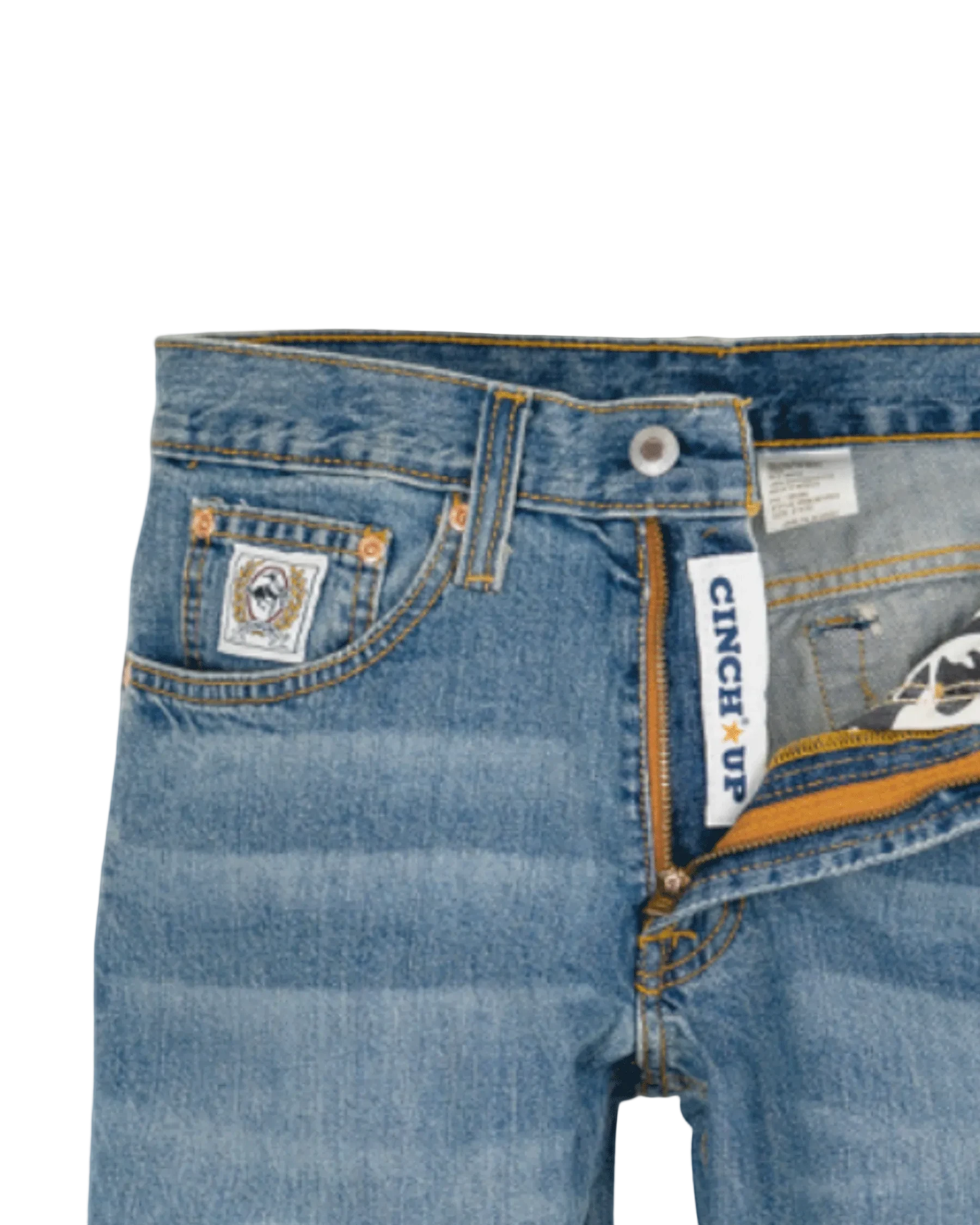 Close-up of blue jeans with visible branding on a white background