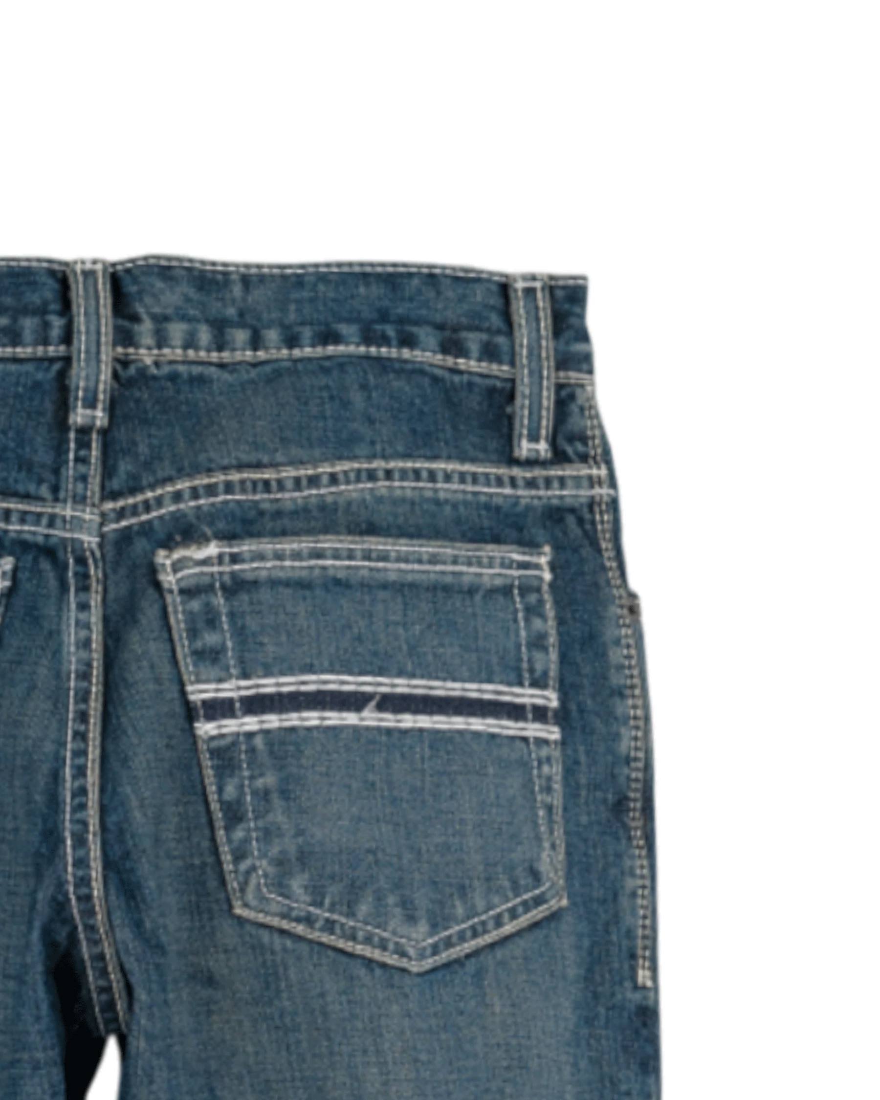 Close-up of blue denim jeans on a white background