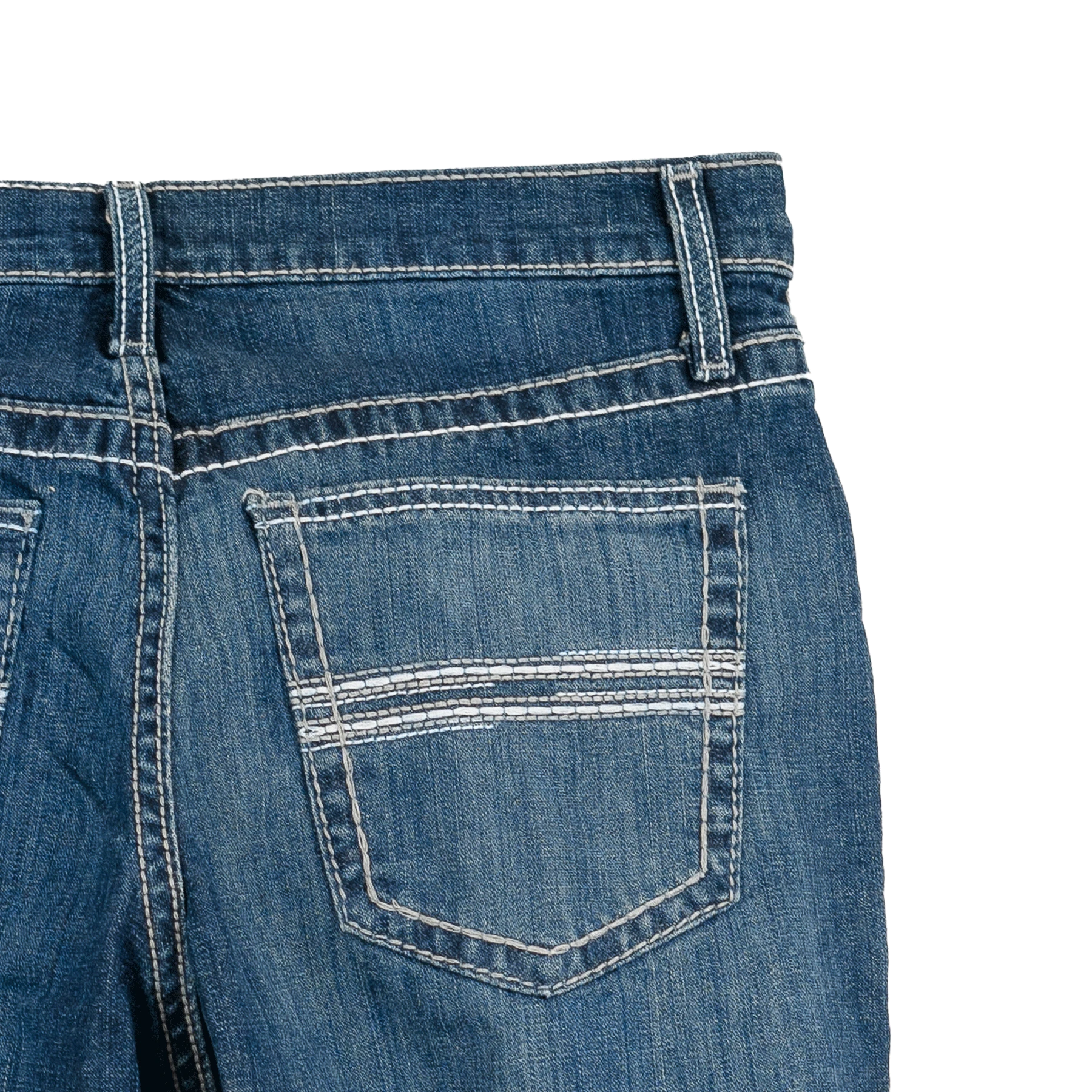 Close-up of blue denim jeans with a pocket on a white background
