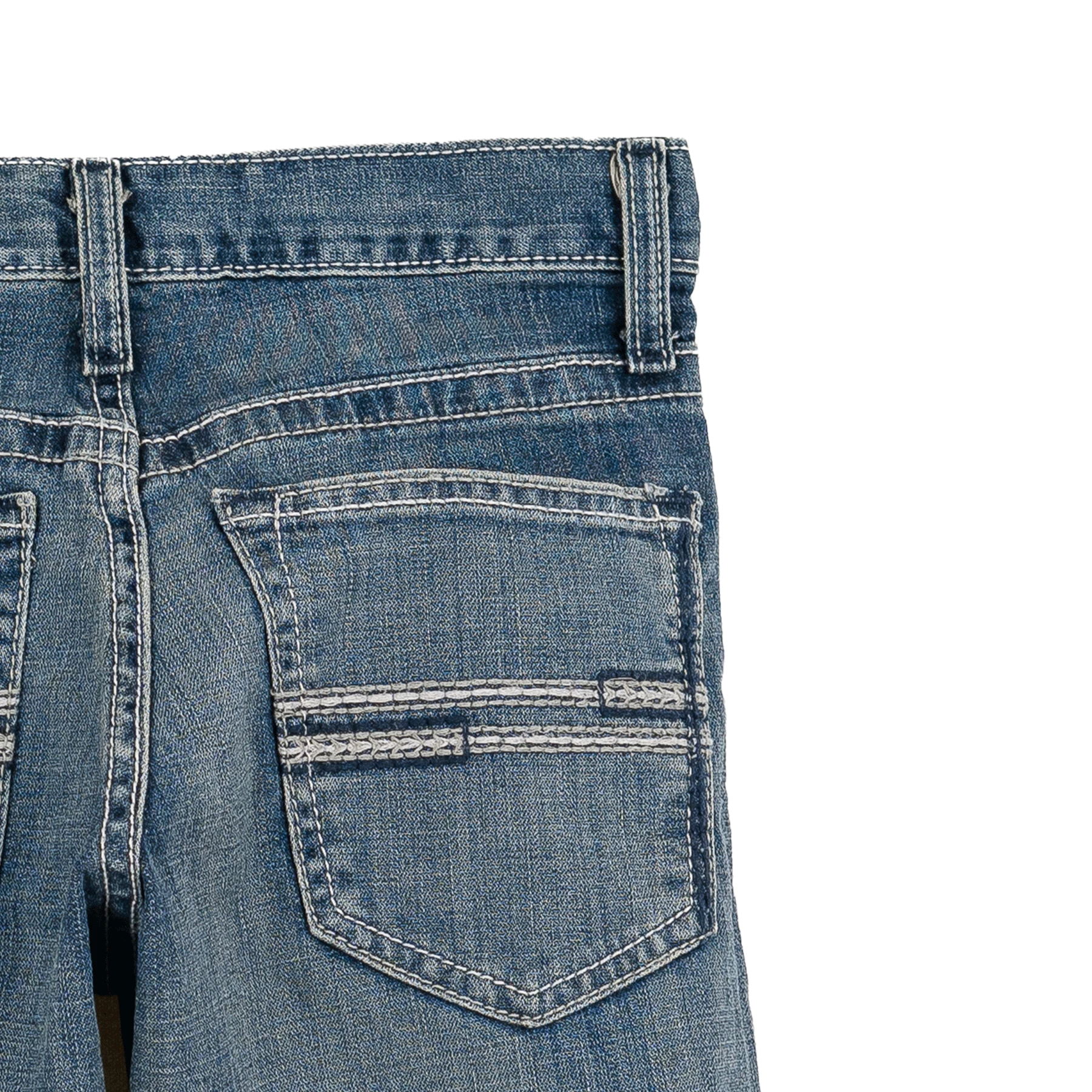 Close-up of blue denim jeans with a pocket on a white background