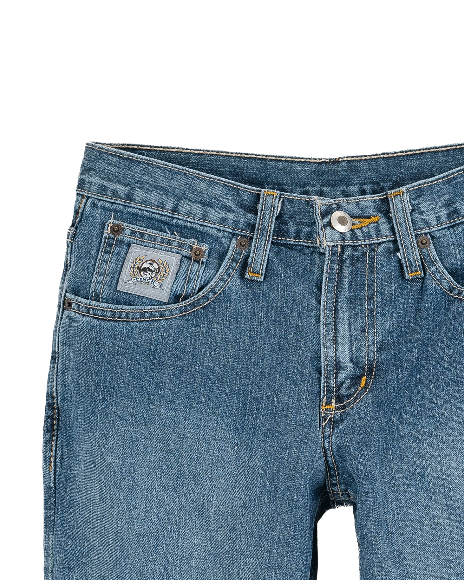 Close-up of a blue denim jeans with a brand logo on a white background