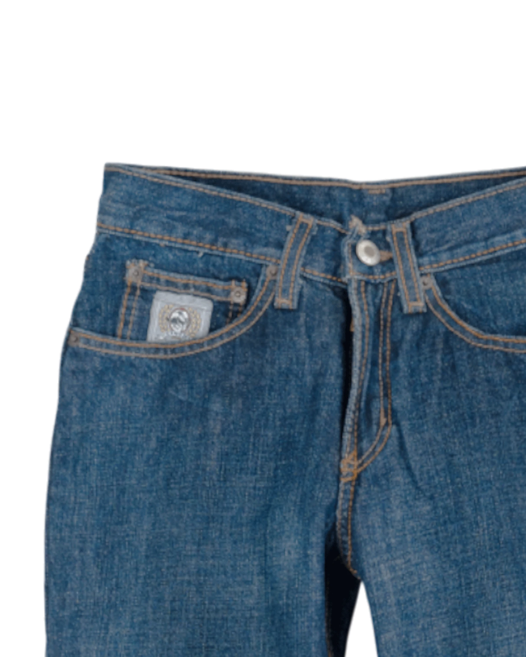 Close-up of blue jeans with a button and back pocket on a white background