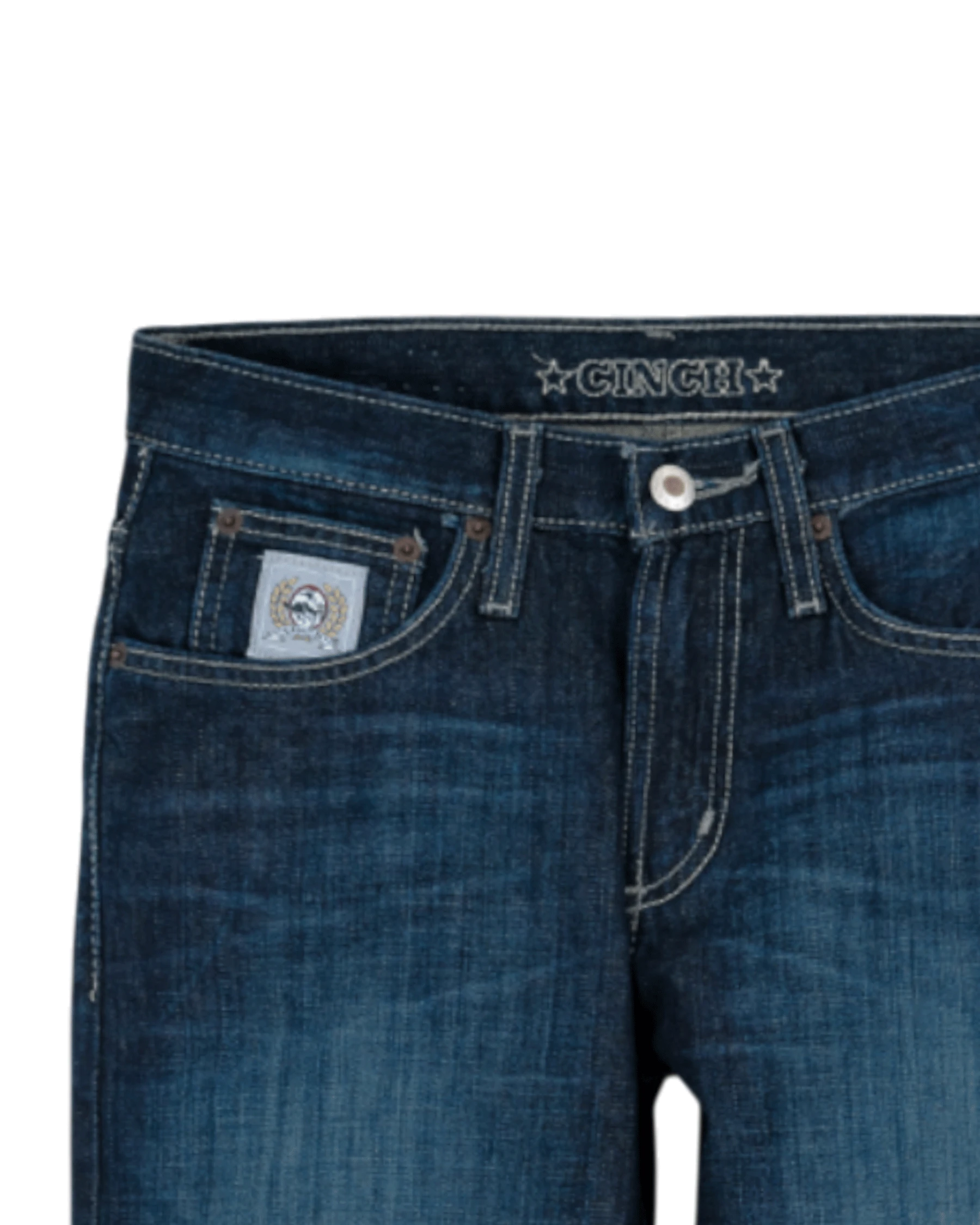 Close-up of blue jeans with Cinch branding on a white background