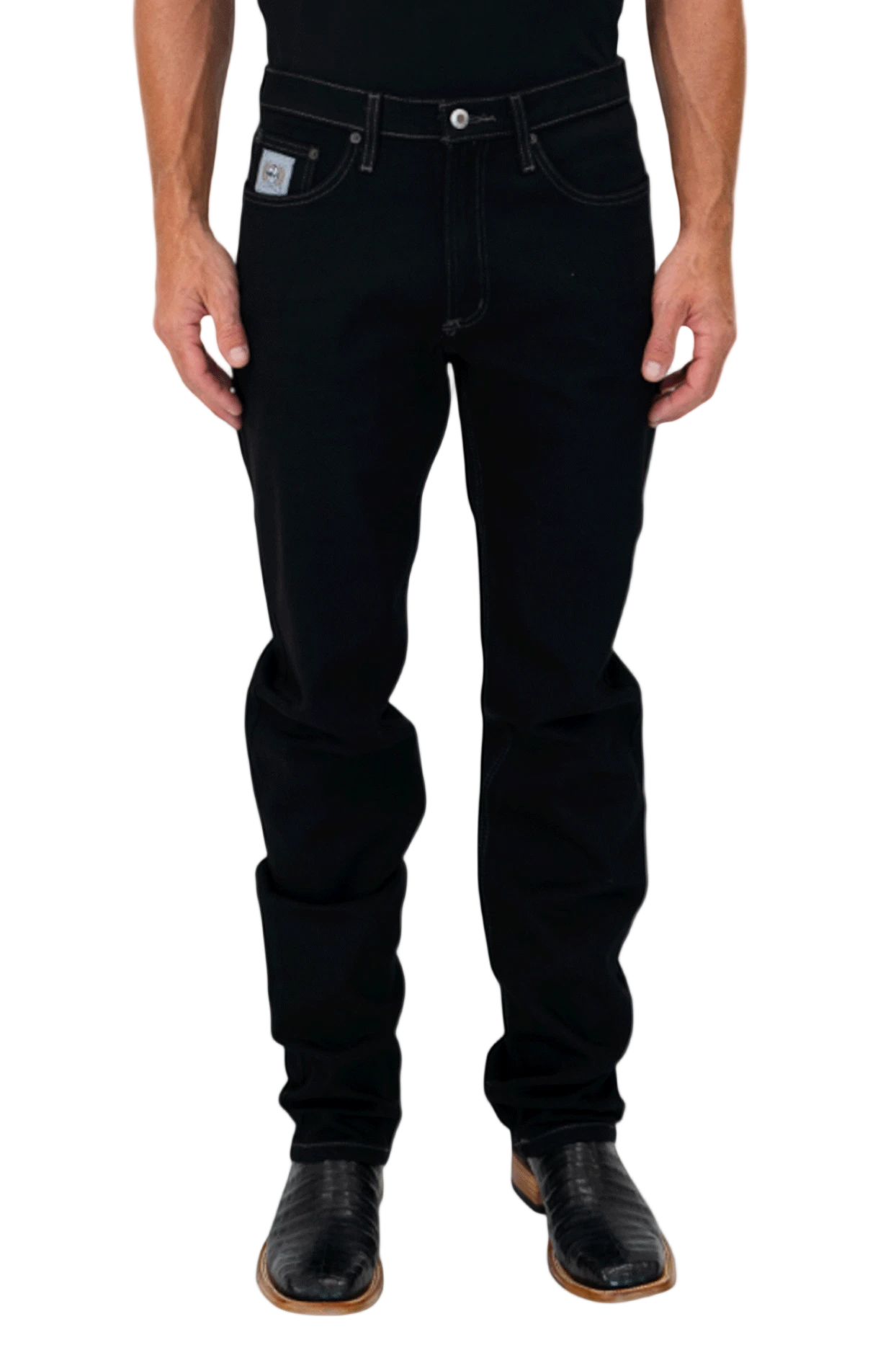 Person wearing black jeans on a white background