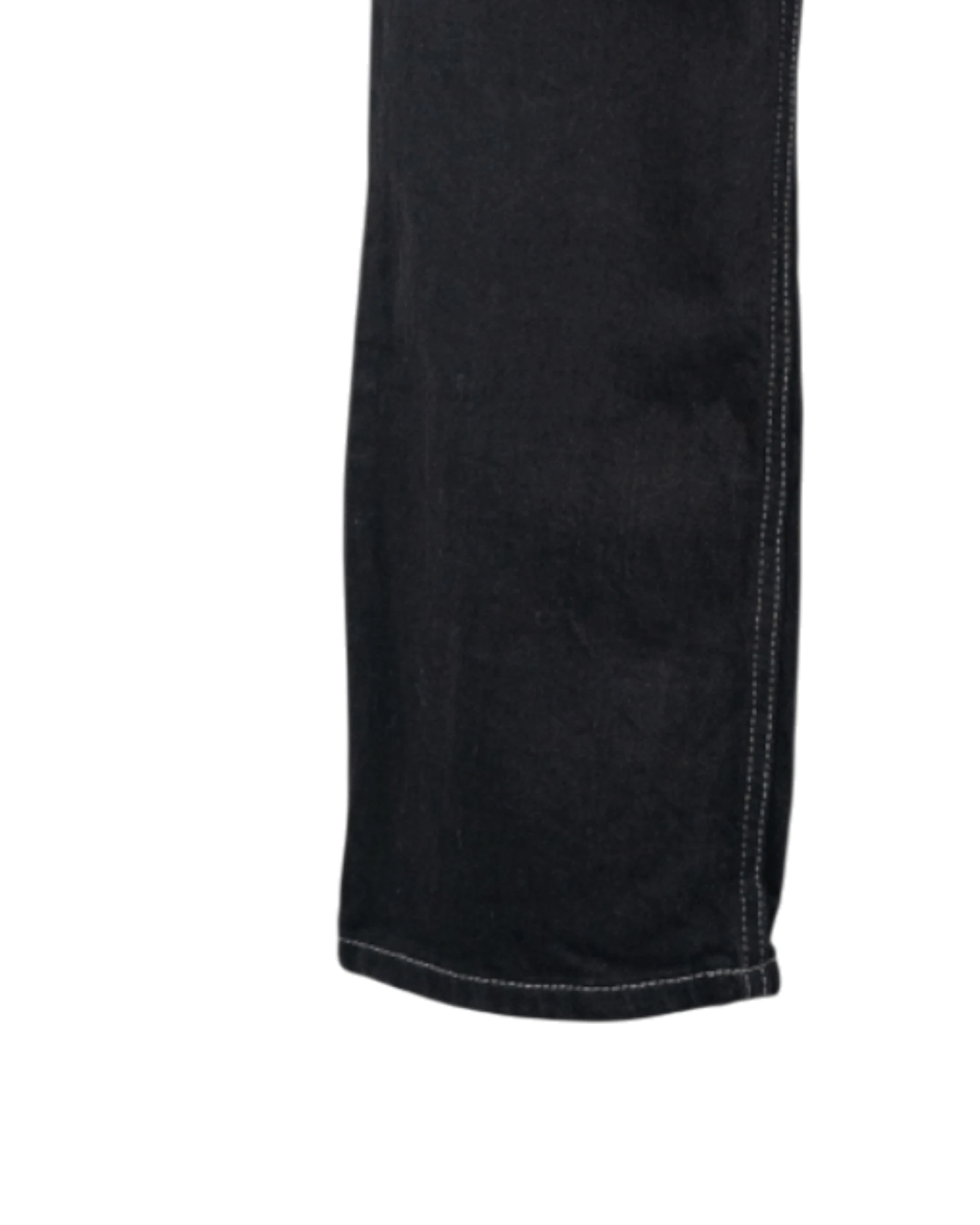 Close-up of a black denim fabric with visible stitching on a white background