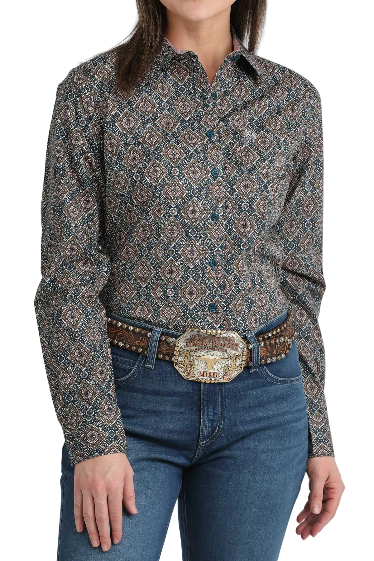Woman wearing a patterned shirt and jeans with a belt on a white background
