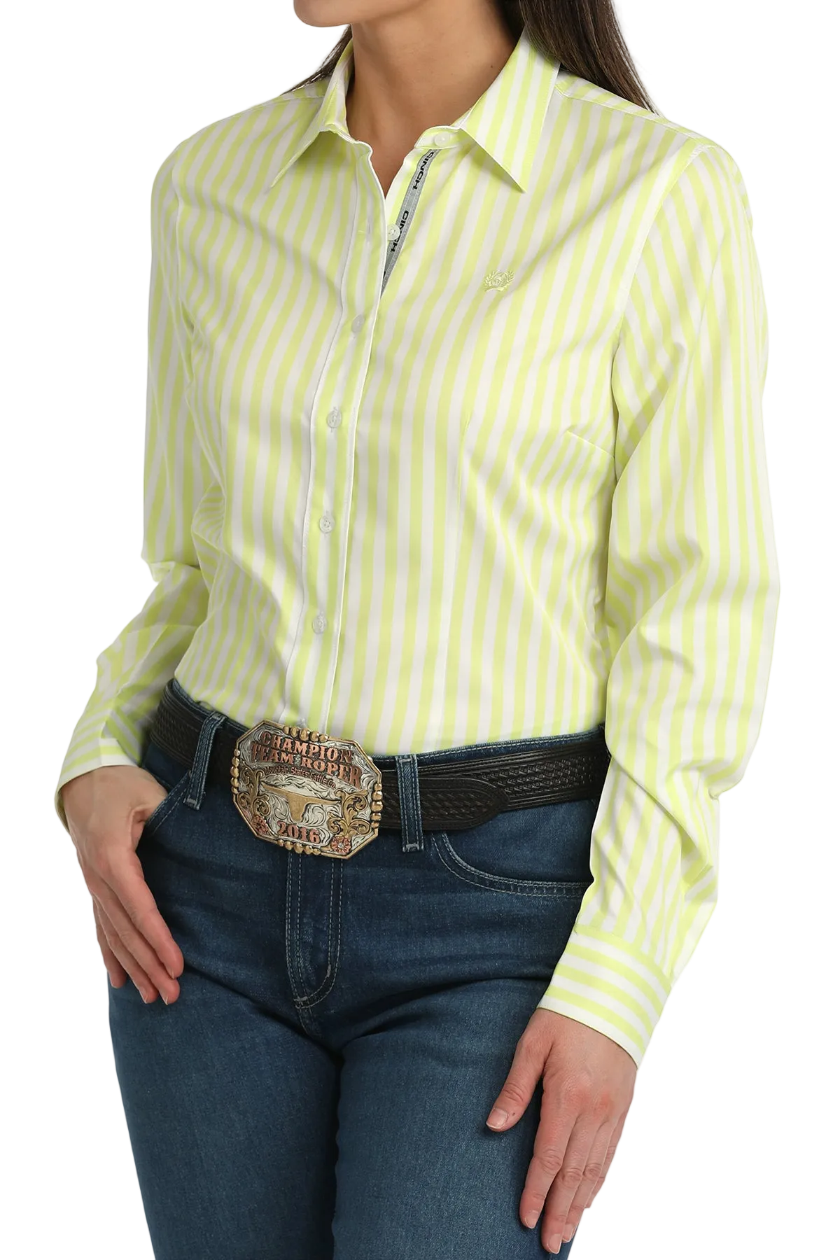 Person wearing a yellow and white striped shirt with blue jeans on a white background