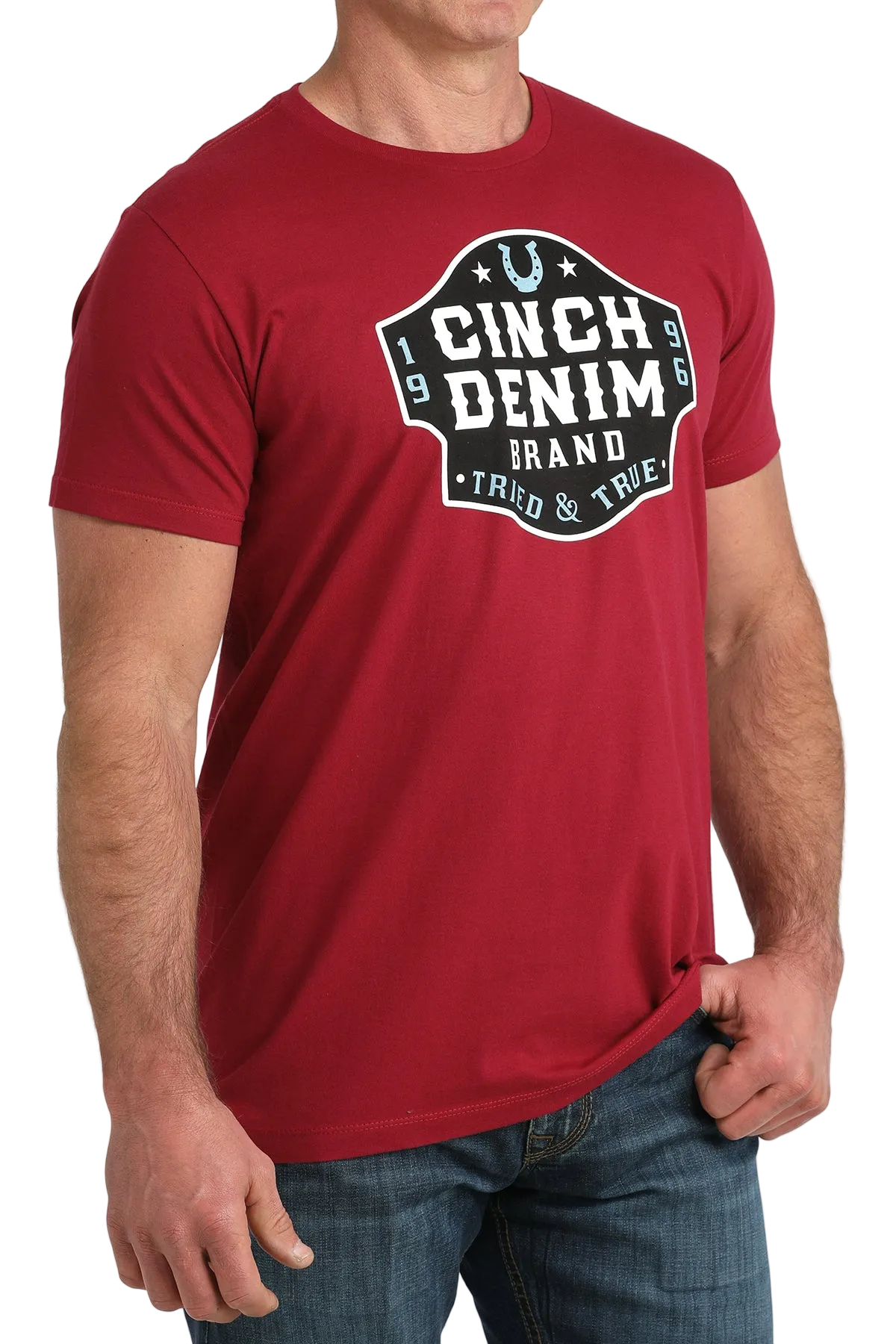 Red t-shirt with 'Cinch Denim' logo worn by a person on a white background